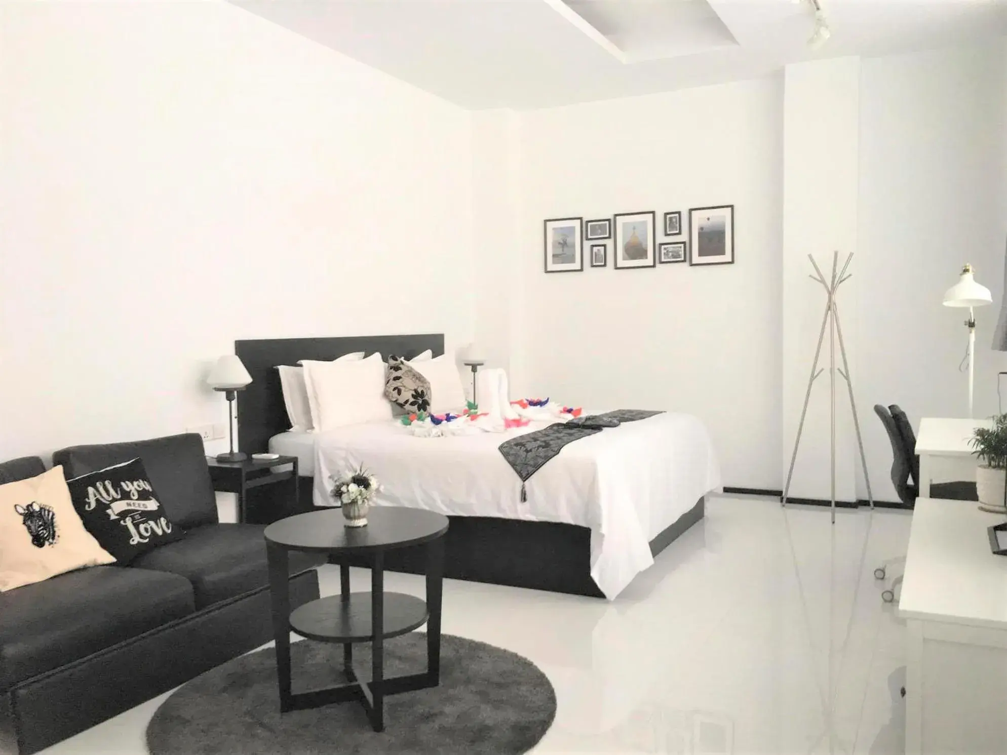 Living room, Bed in YAMA HOTEL & ROOFTOP BAR Living room, Bed in YAMA HOTEL & ROOFTOP BAR