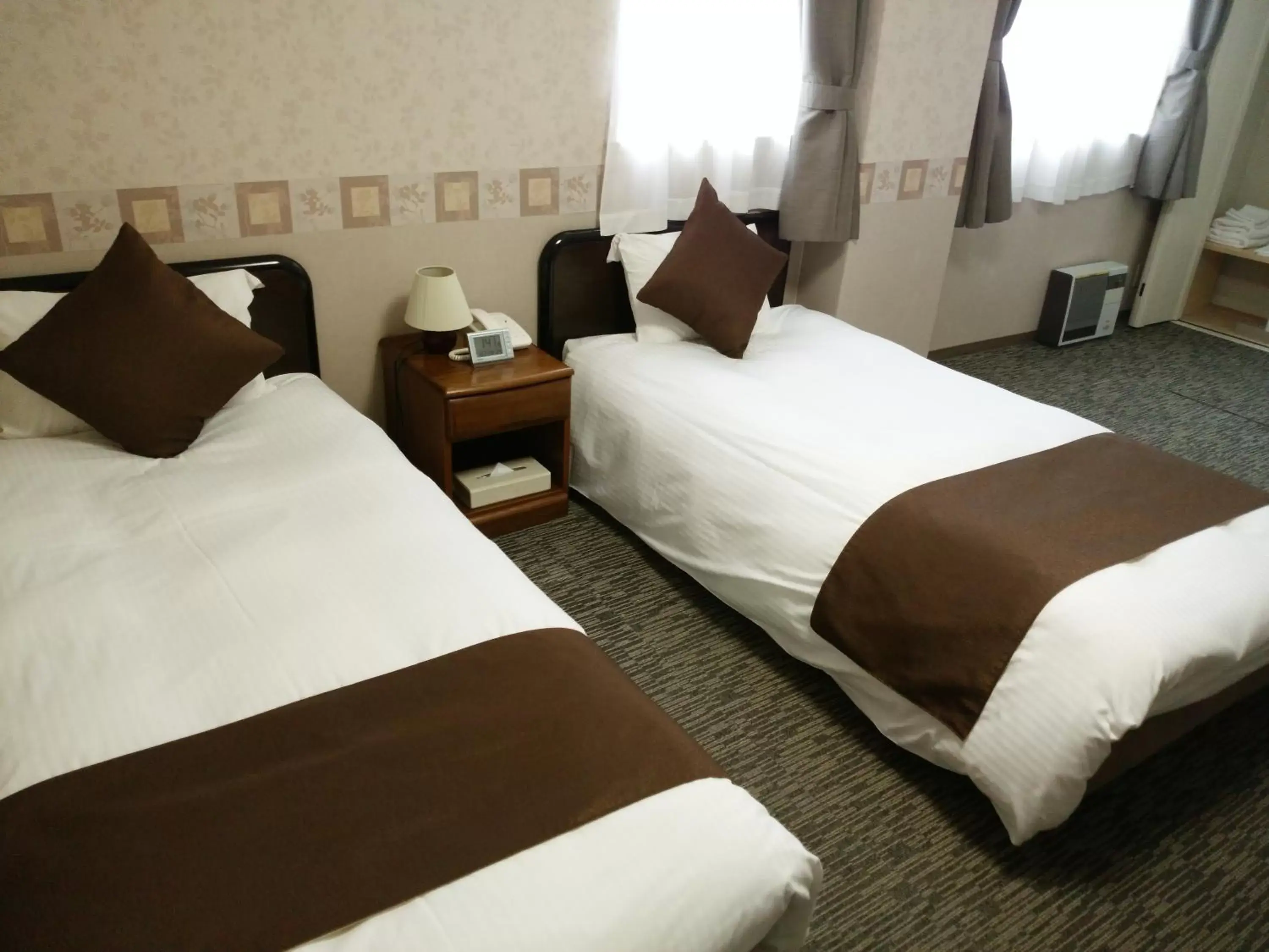 Photo of the whole room, Bed in Resort Inn North Country