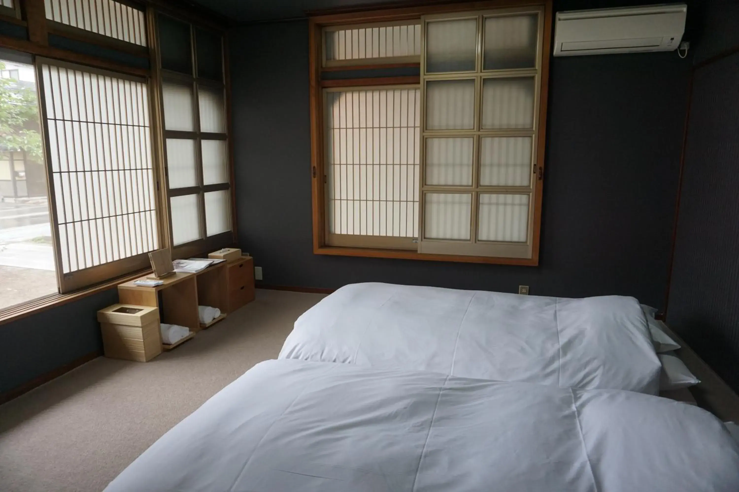 Bed in TEMPLE HOTEL TAKAYAMA ZENKOJI