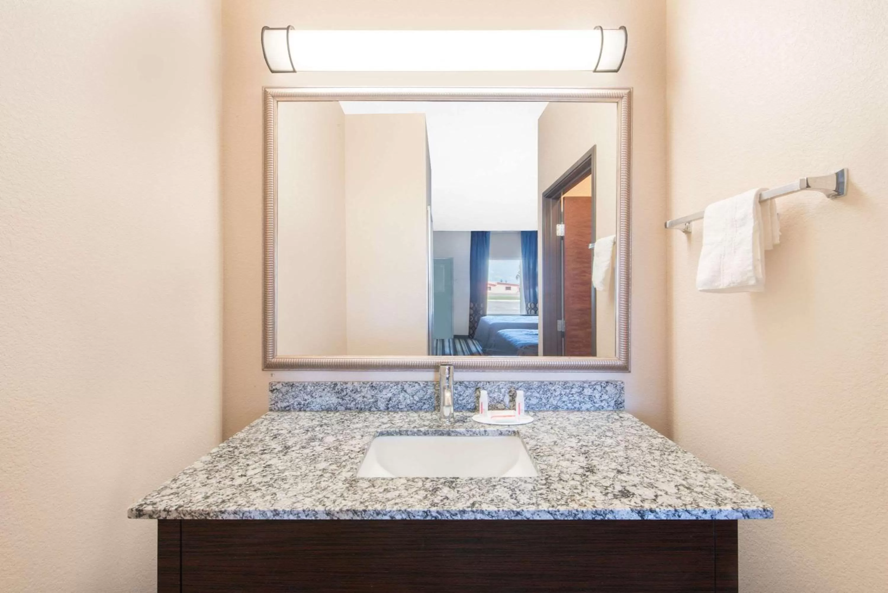 Bathroom in Super 8 by Wyndham Dilley TX