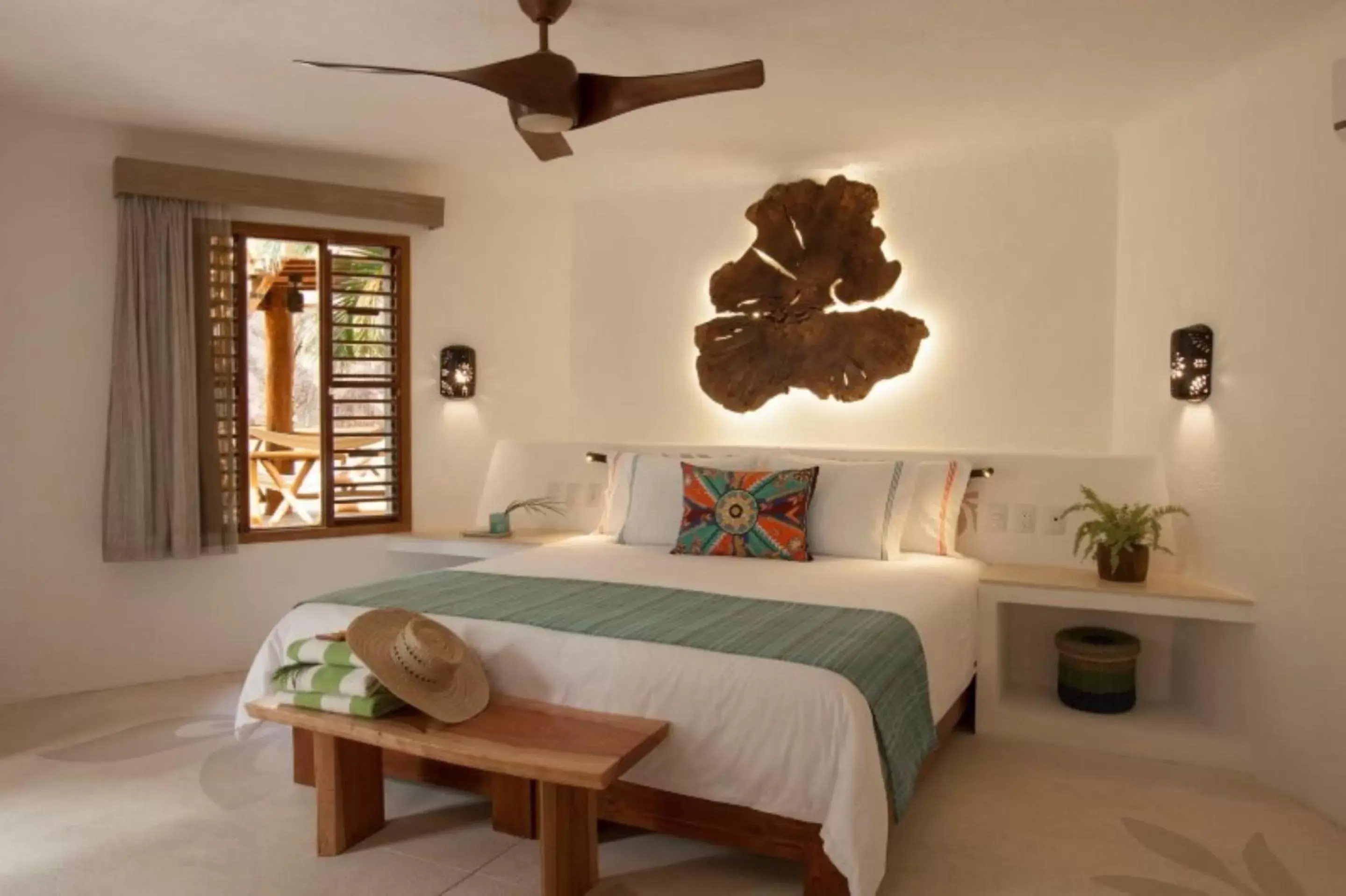 Bed in Mahekal Beach Front Resort & Spa