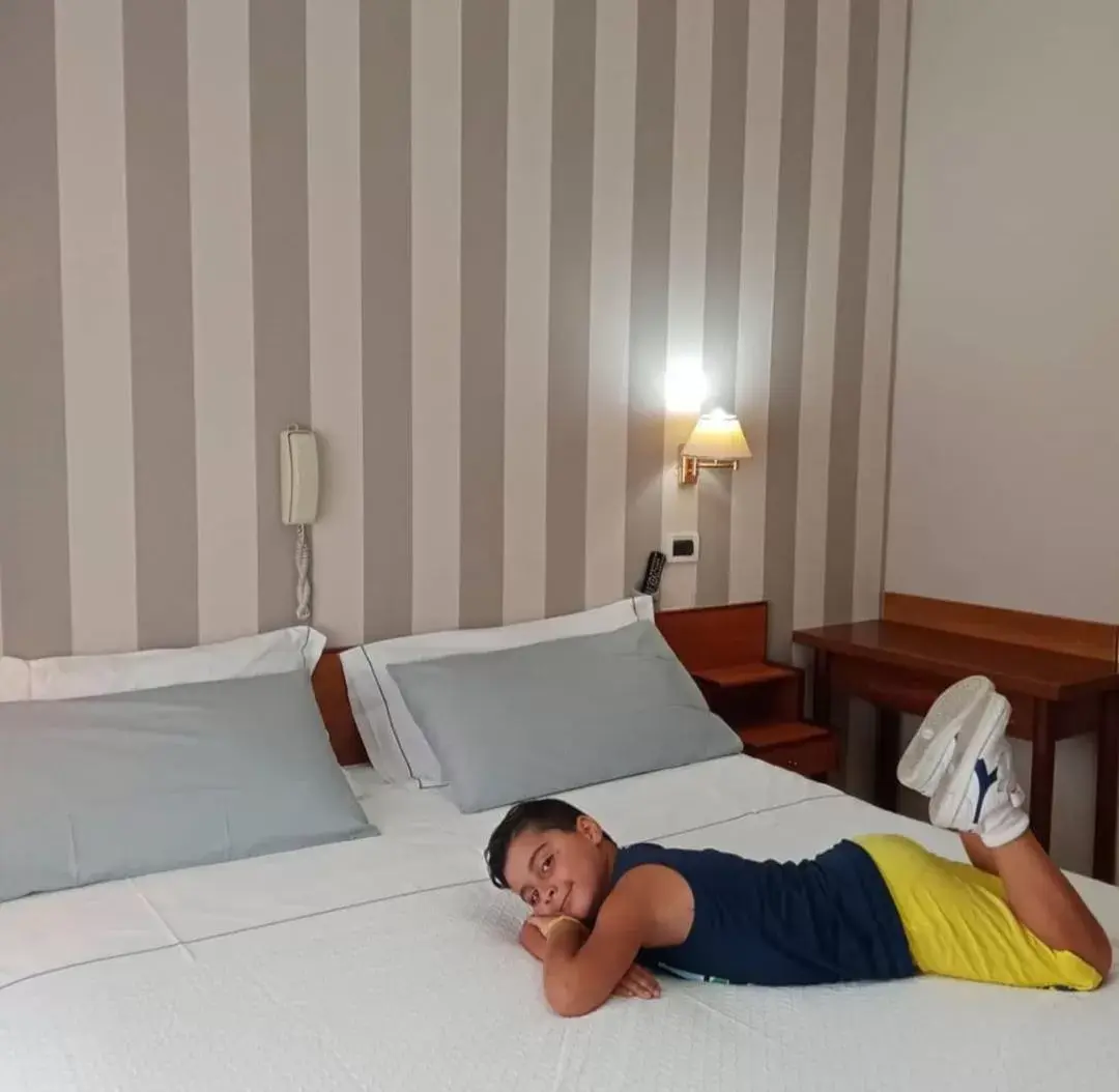 Bed in Hotel Marconi