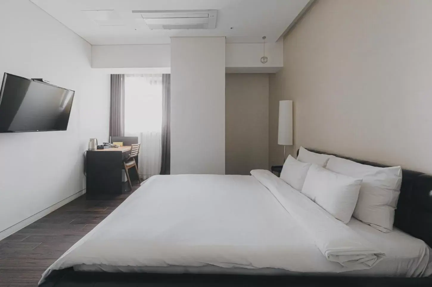 Bed in ACC Design Hotel