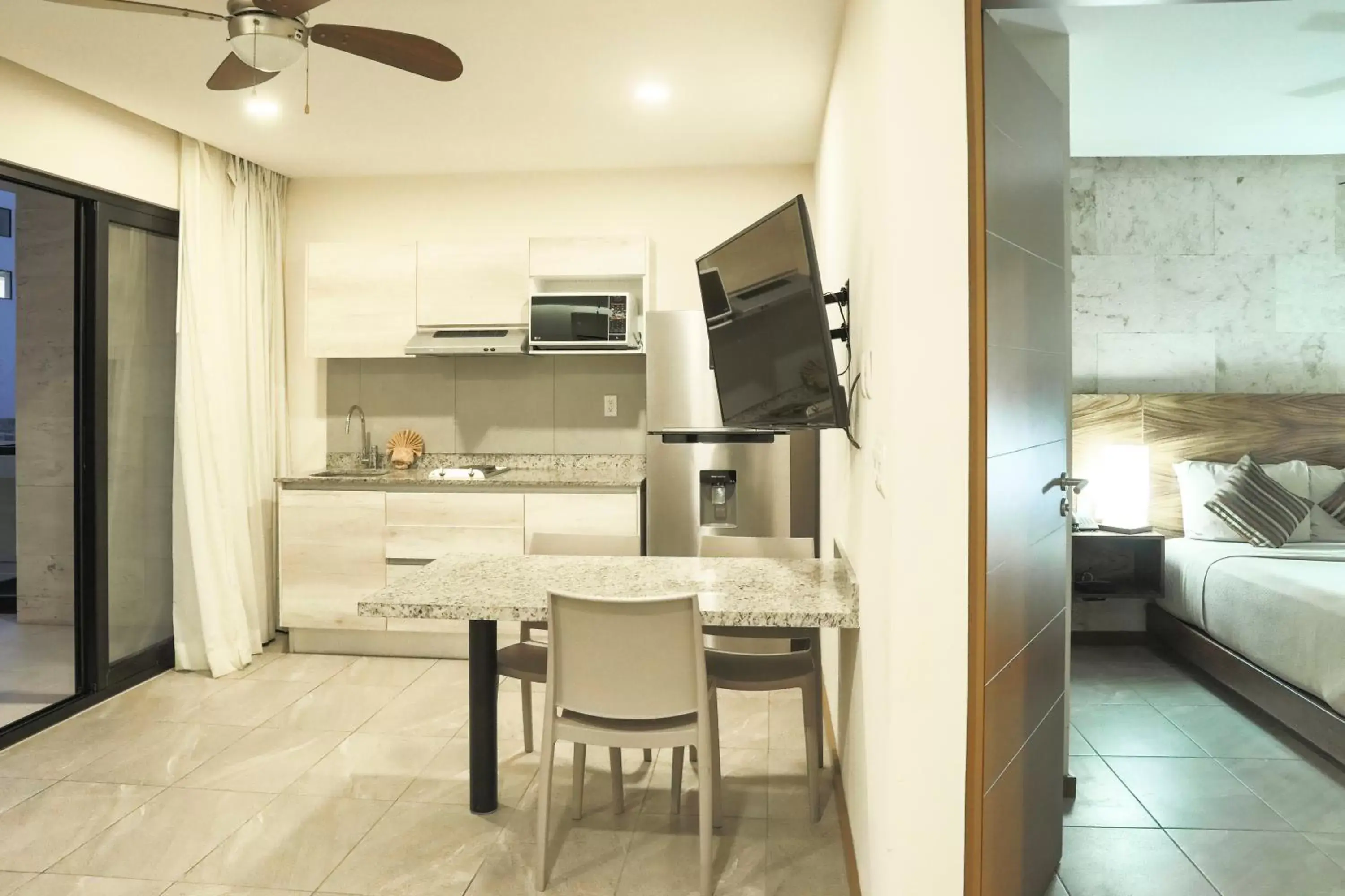Kitchen/Kitchenette in Grand Fifty Suites