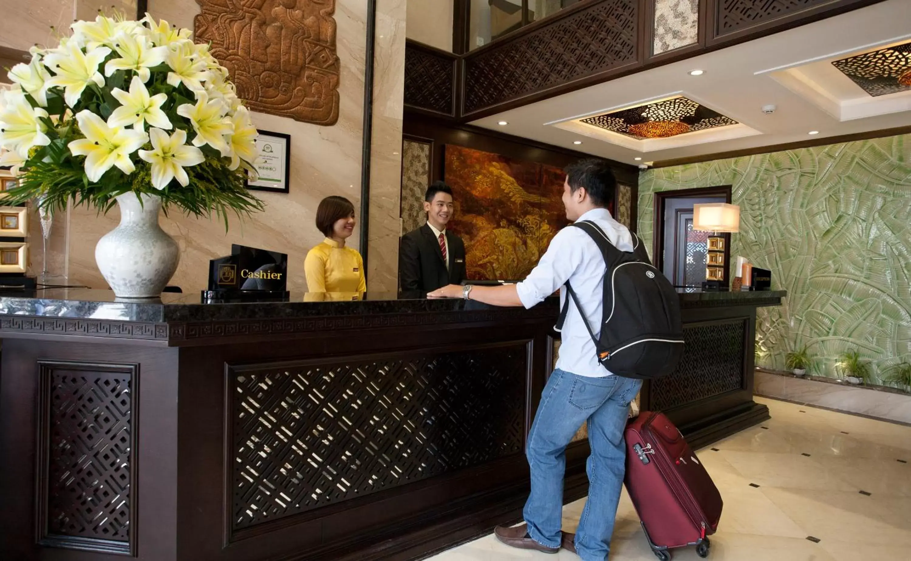 Staff in Golden Lotus Luxury Hotel