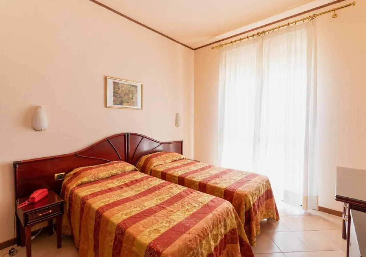 Bedroom, Bed in Hotel Villa Delle Rose