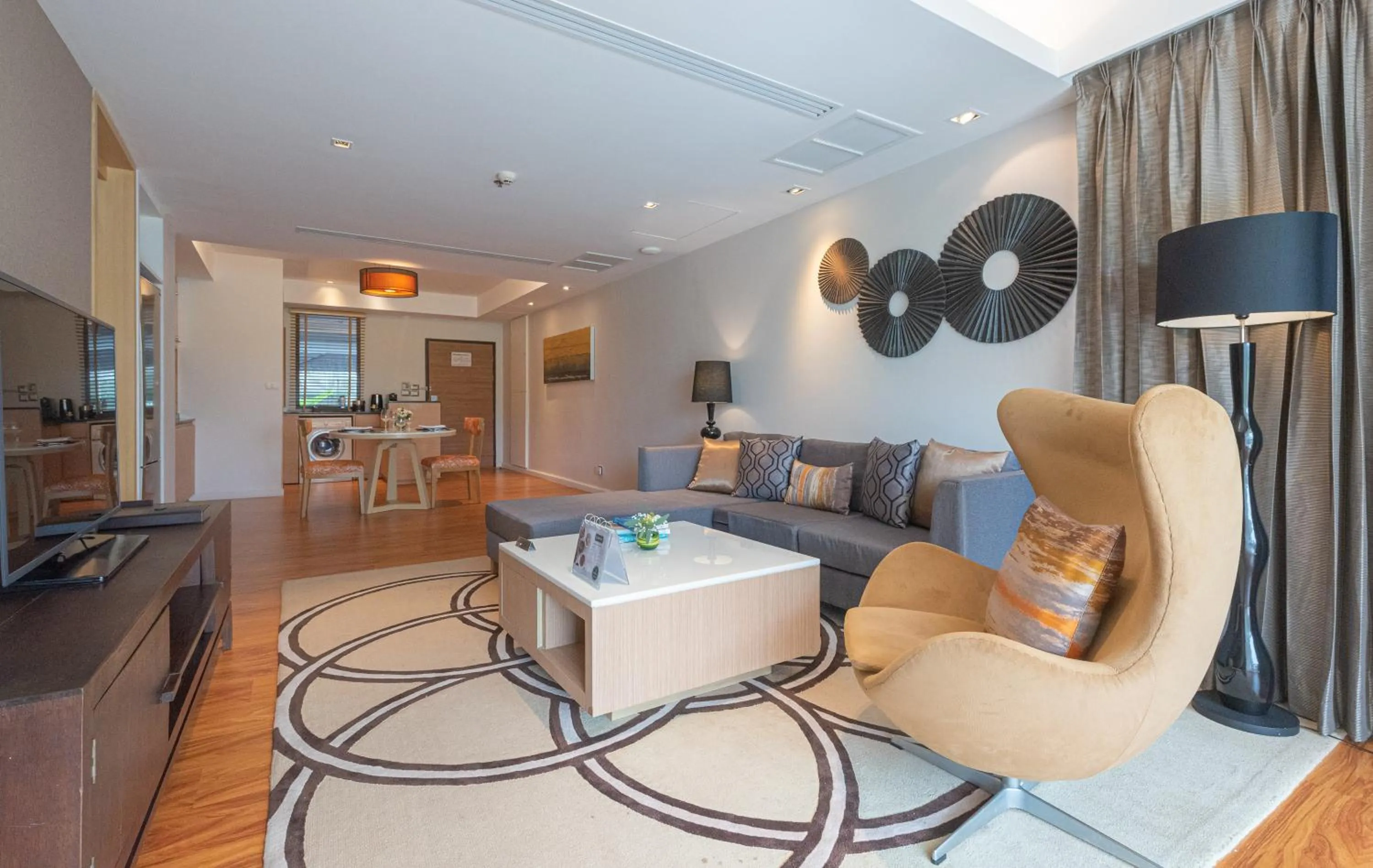 Living room in Summit Windmill Golf Suite Hotel at Suvarnabhumi