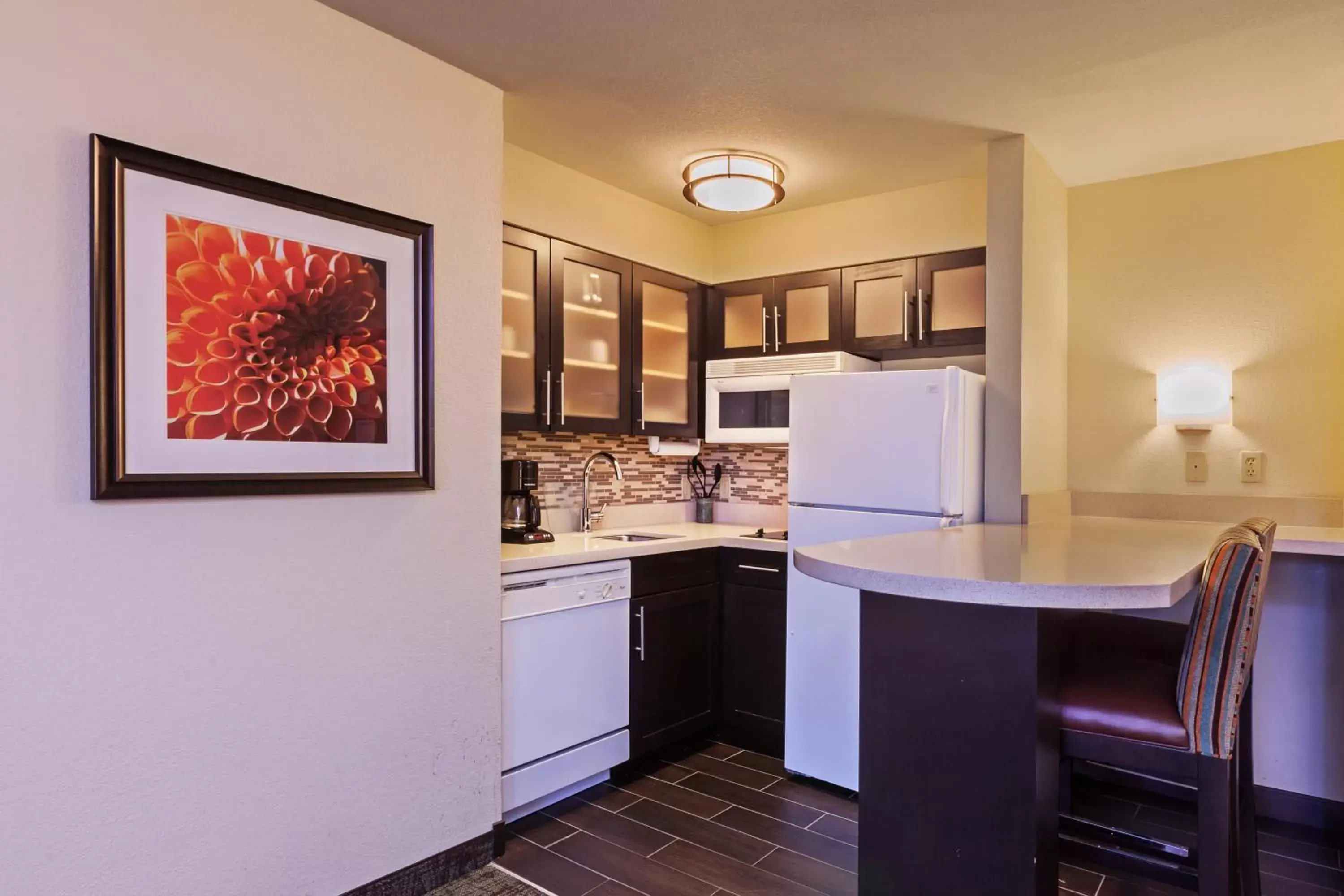Photo of the whole room, Kitchen/Kitchenette in Staybridge Suites Tulsa-Woodland Hills, an IHG Hotel