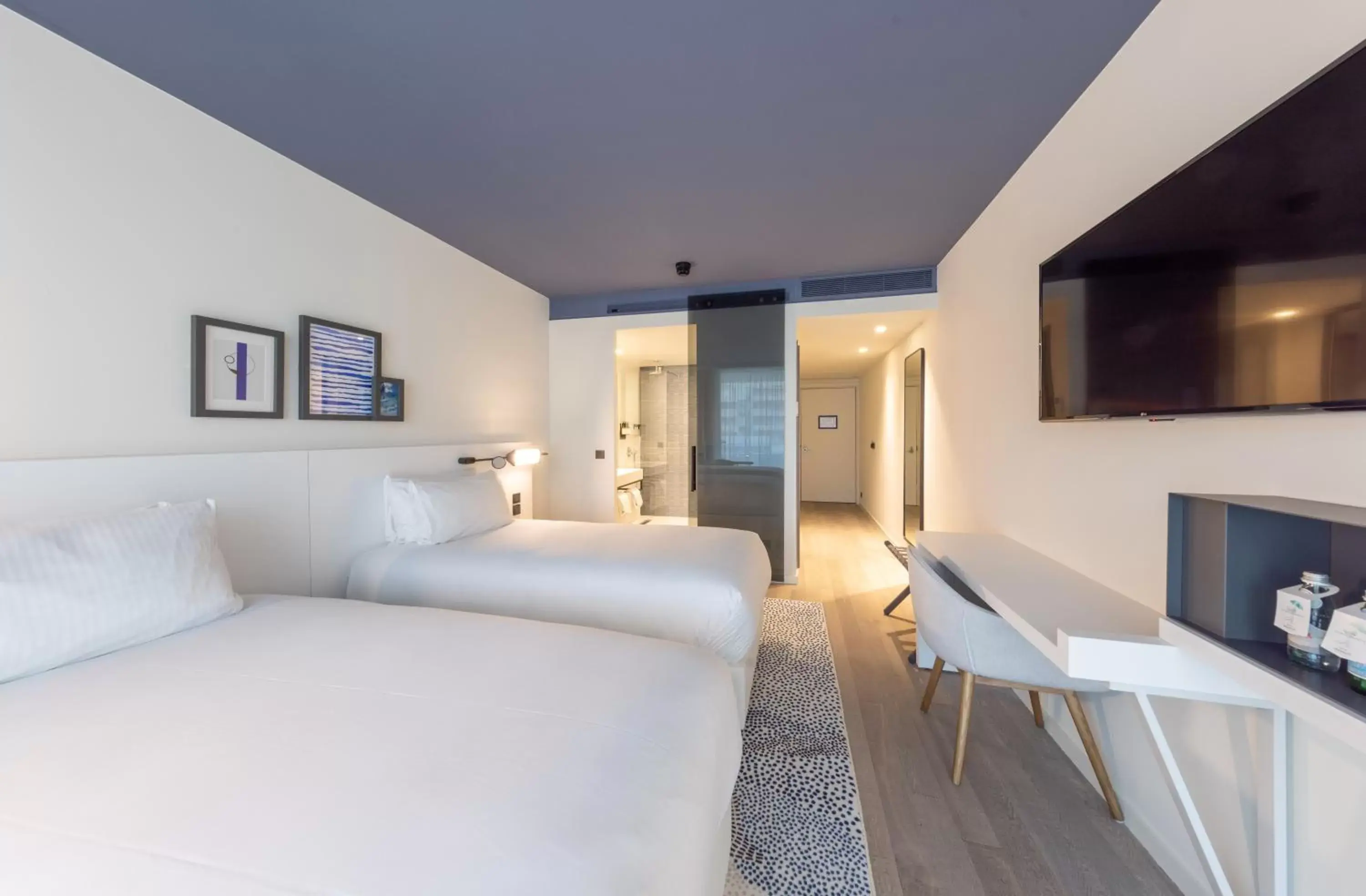 Bed in Hotel Indigo Cagnes-sur-Mer, an IHG Hotel