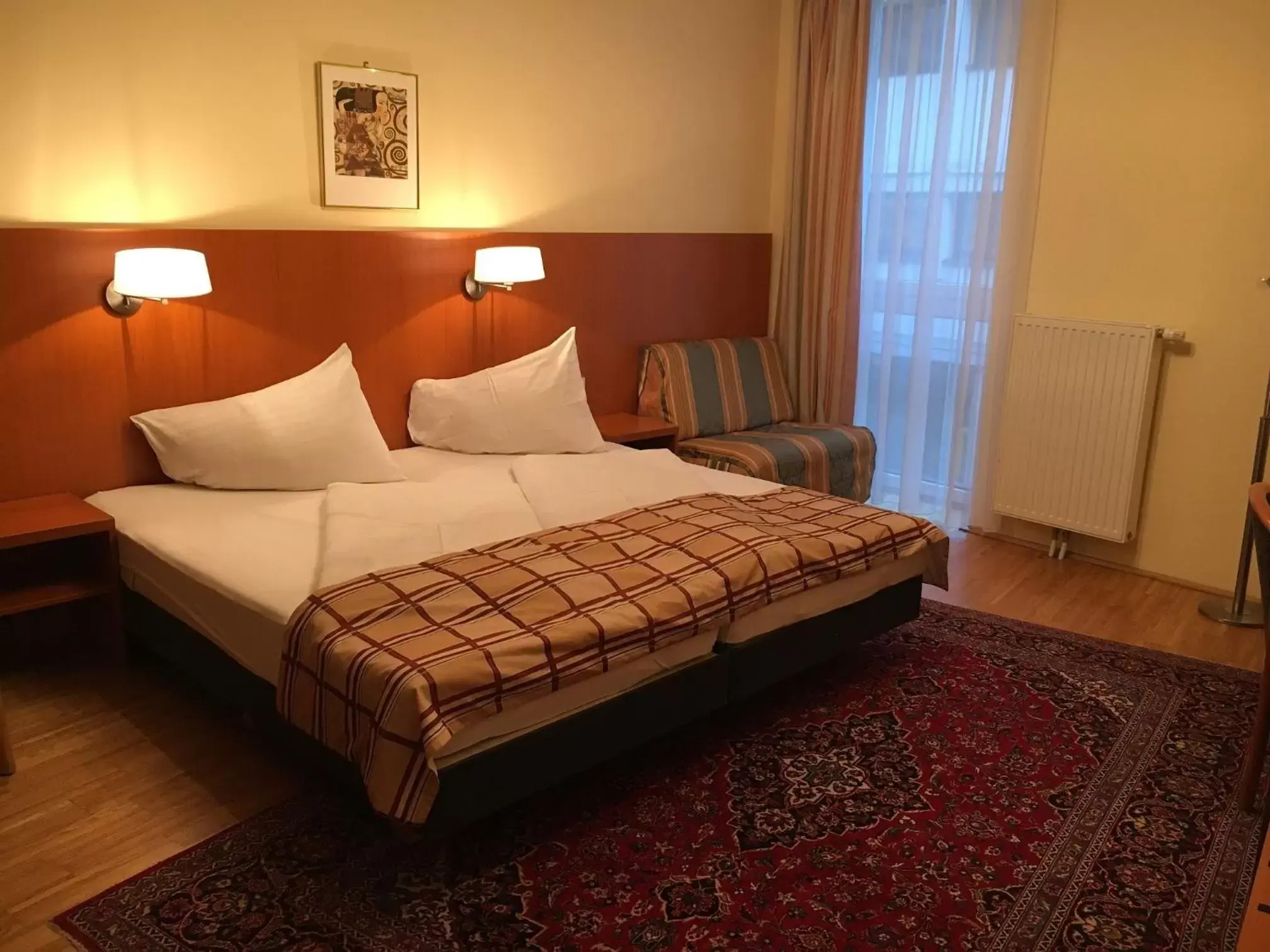 Bed in Continental Hotel-Pension