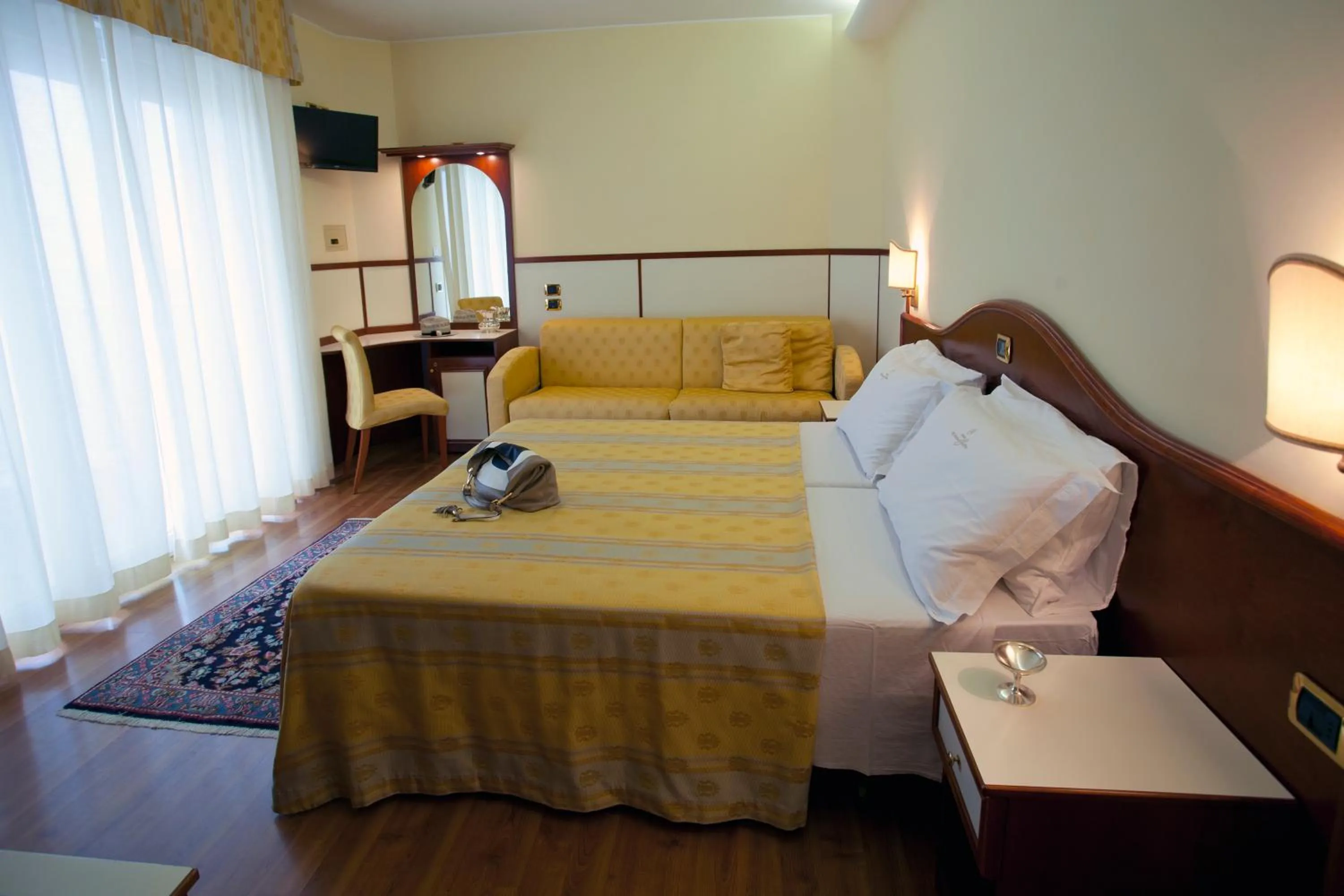 Photo of the whole room, Bed in Hotels Vidi Miramare & Delfino