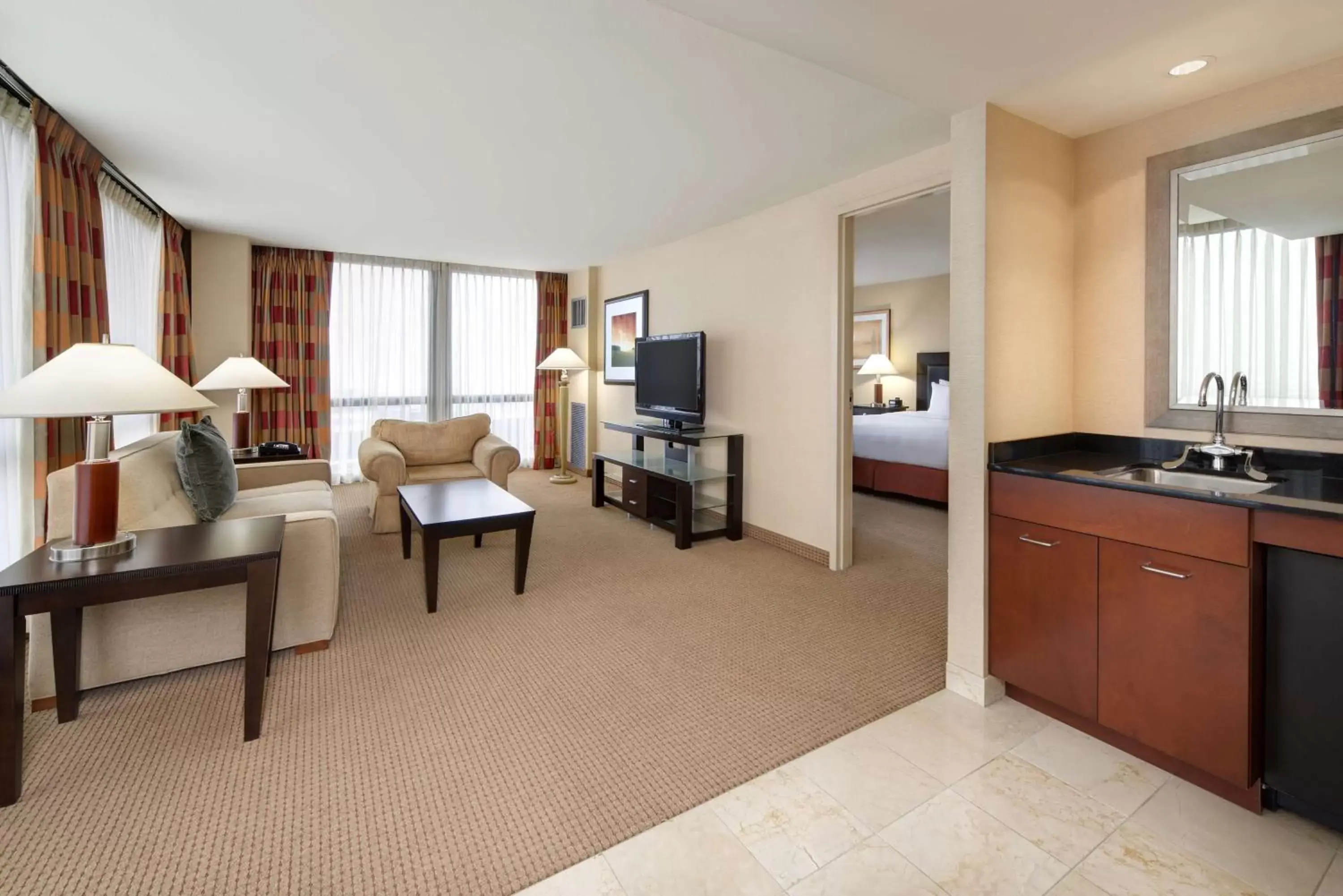 Bedroom, Seating Area in Hilton Chicago O'Hare Airport