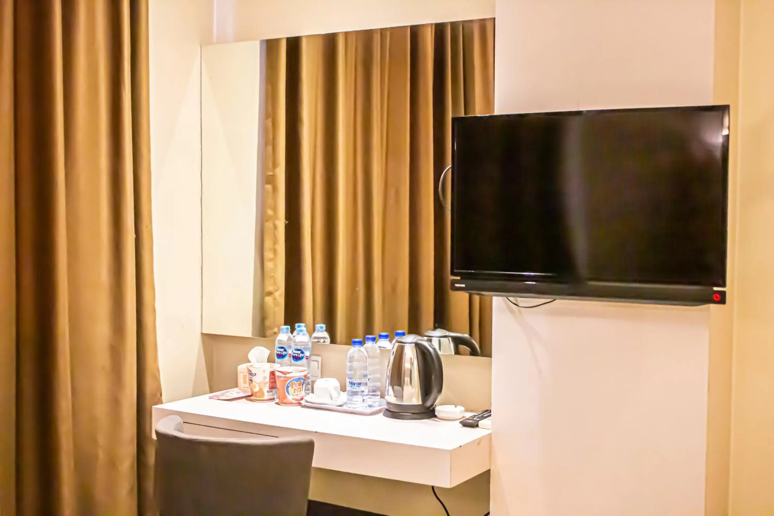 TV and multimedia, TV/Entertainment Center in OS Hotel Airport Batam