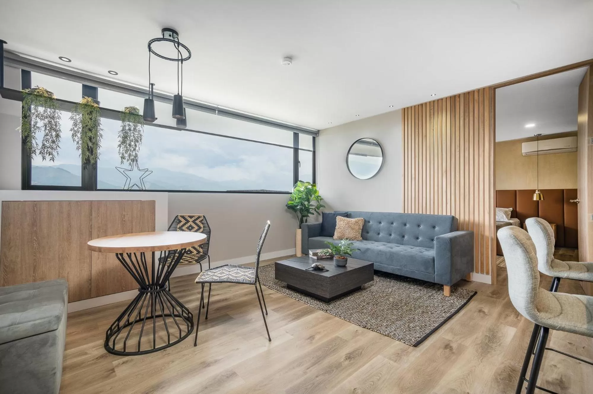 Living room in Apartamentos Go Living & Suites by HOUSY HOST