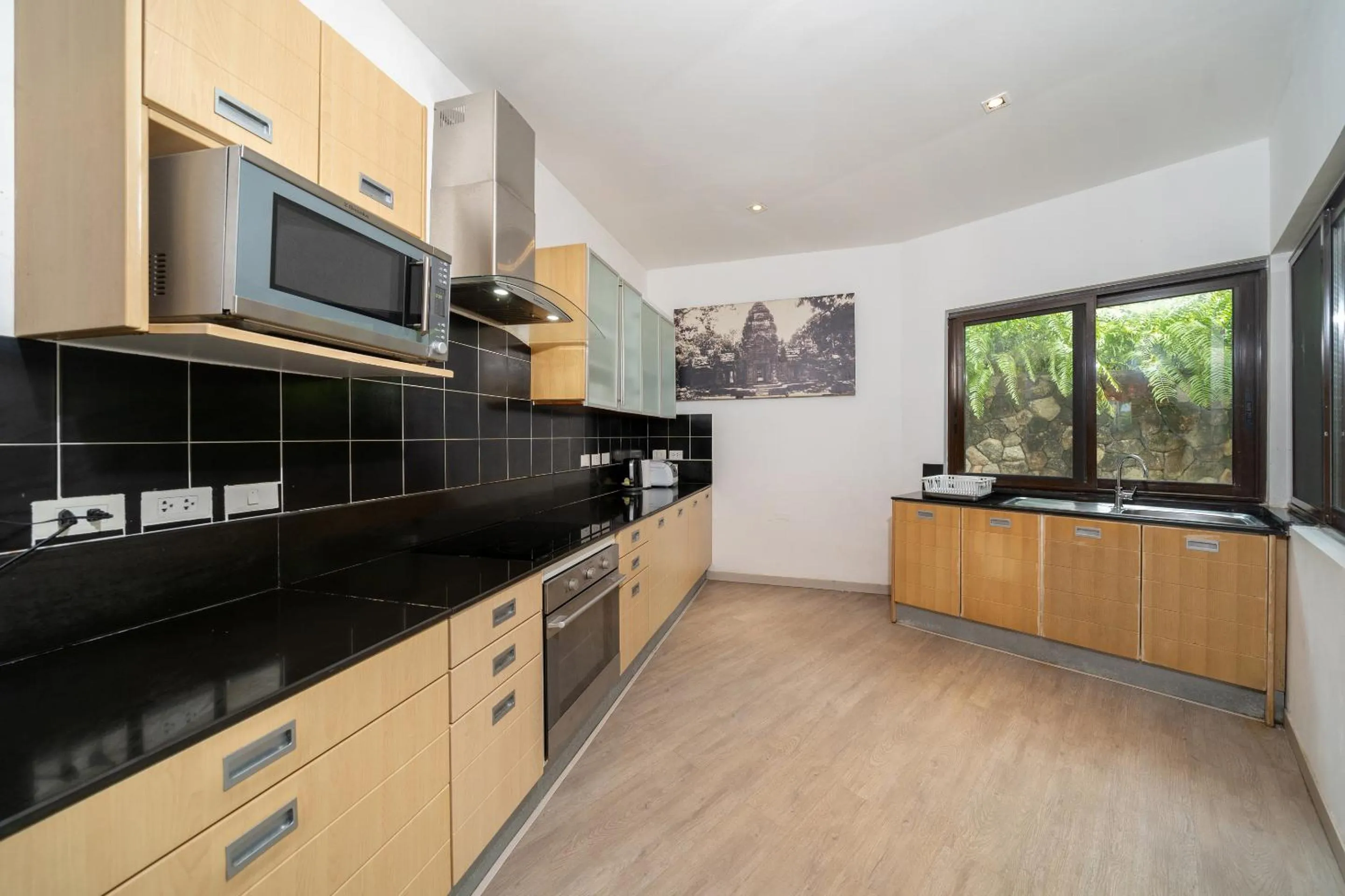 Kitchen or kitchenette in IndoChine Resort and Villas