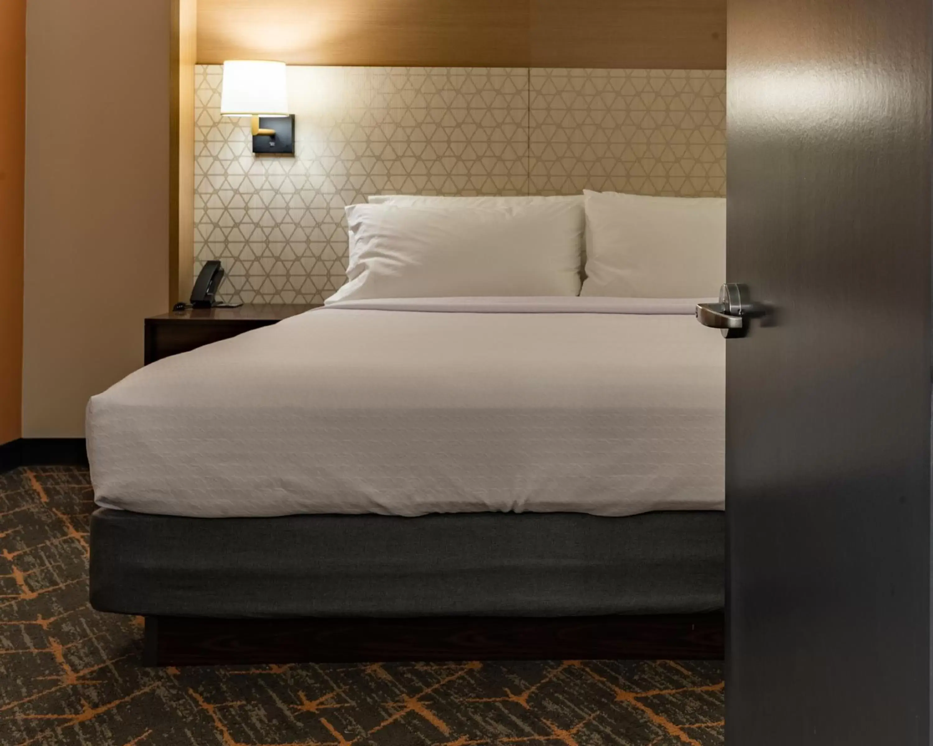 Bed in Holiday Inn & Suites Atlanta Perimeter Dunwoody, an IHG Hotel
