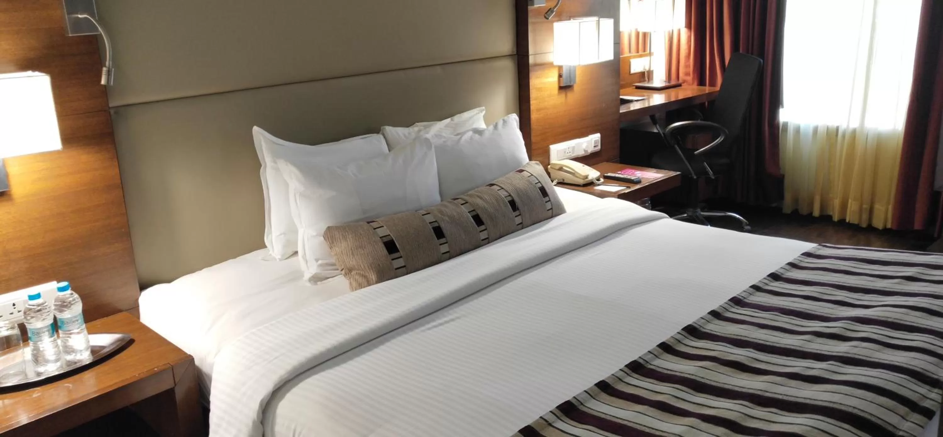 Bed in Royal Orchid Central, Pune