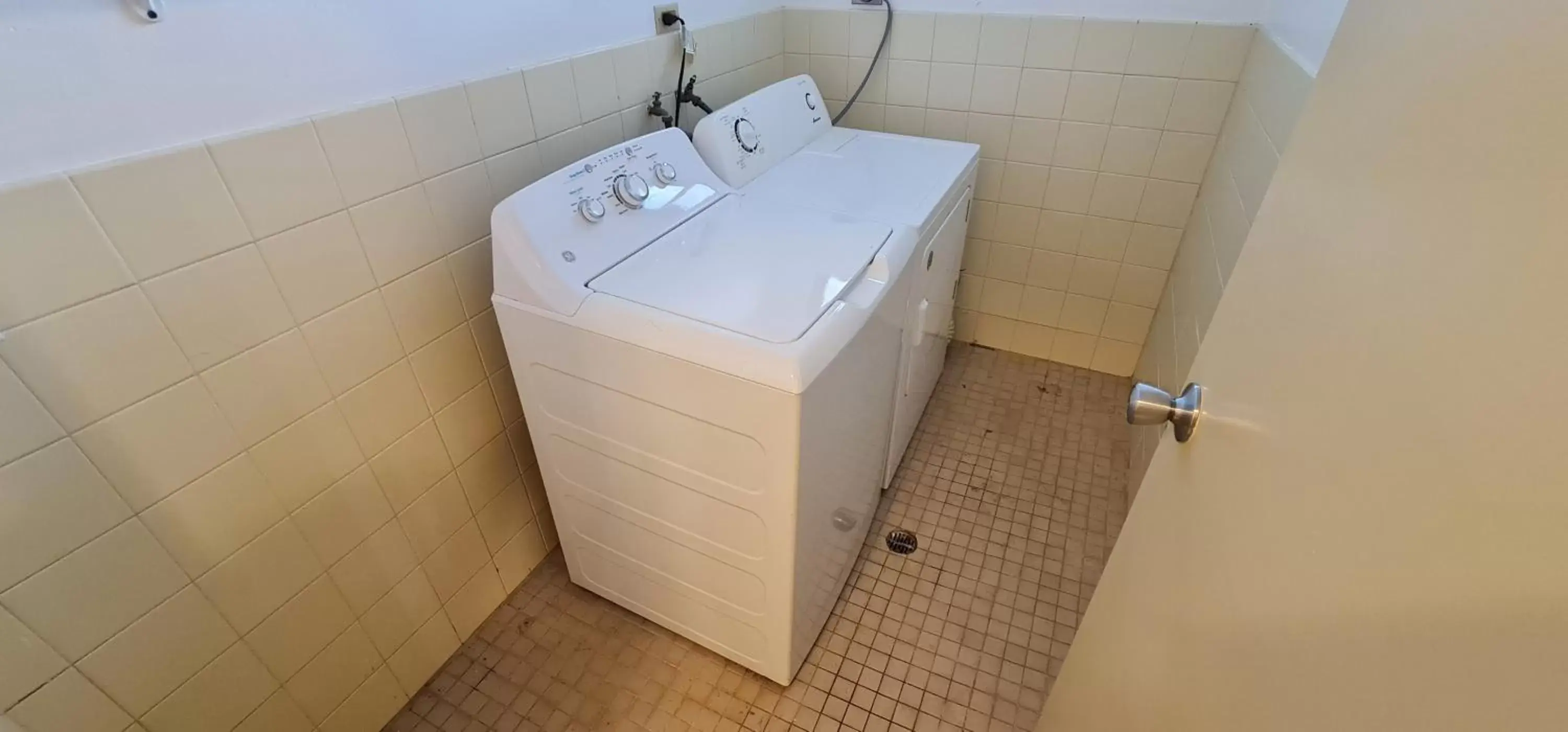 Bathroom in SureStay Hotel by Best Western Guam Palmridge