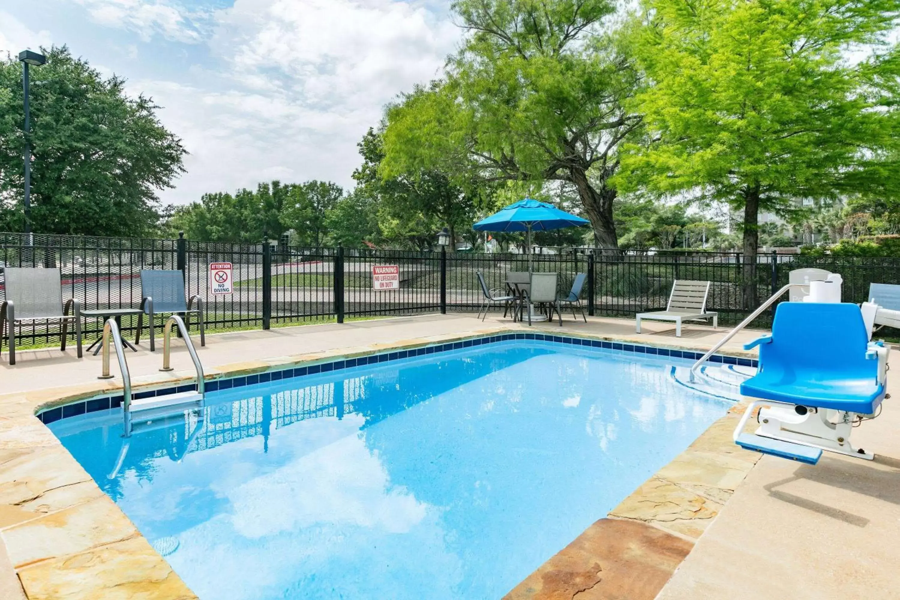 Pool view, Swimming Pool in Microtel Inn & Suites by Wyndham Austin Airport