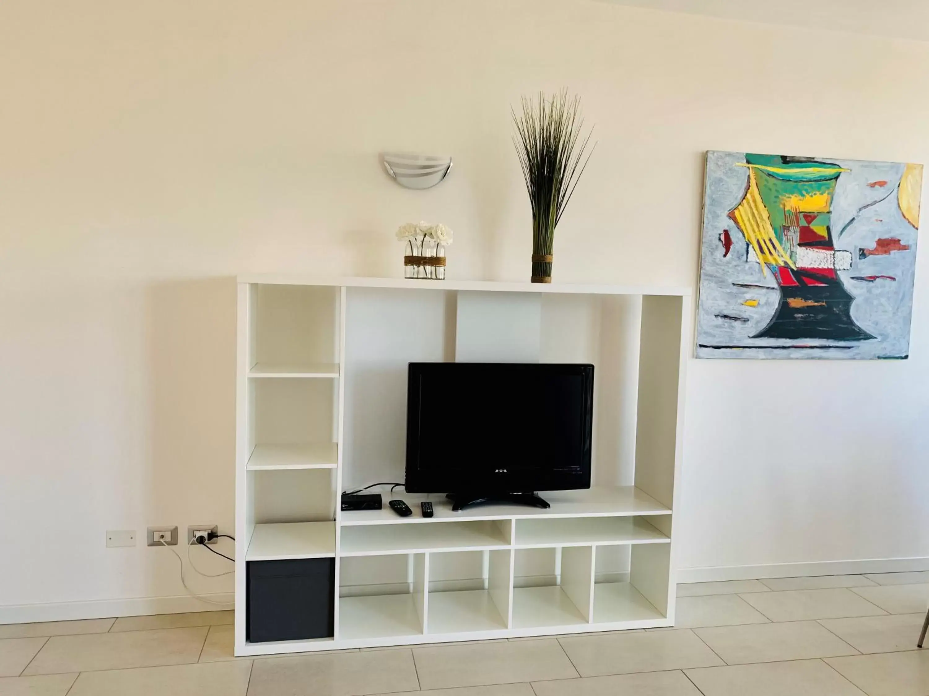 TV and multimedia, TV/Entertainment Center in Front Lake Apartment Bardolino