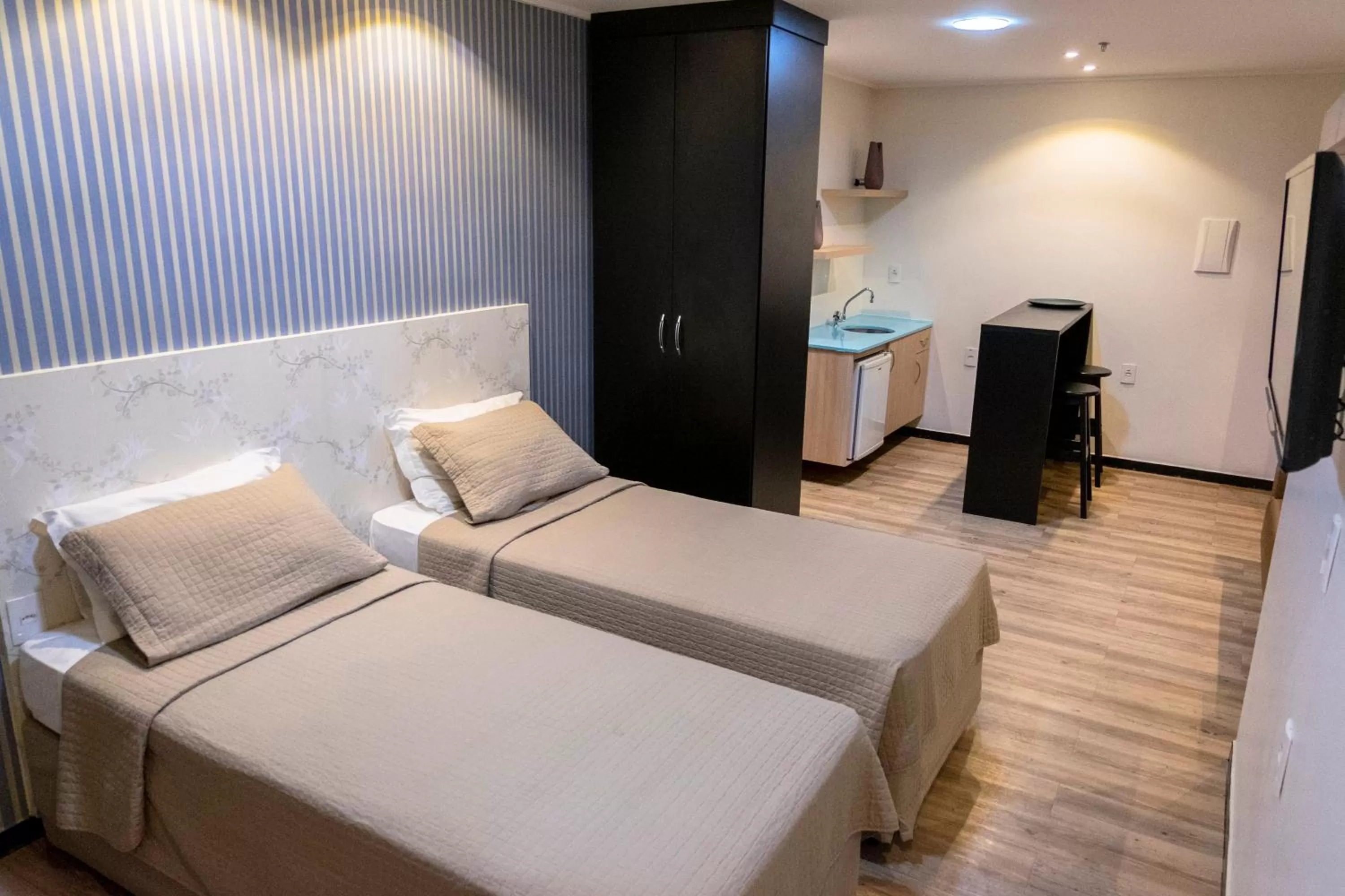 Bed in Arrey Executive Hotel