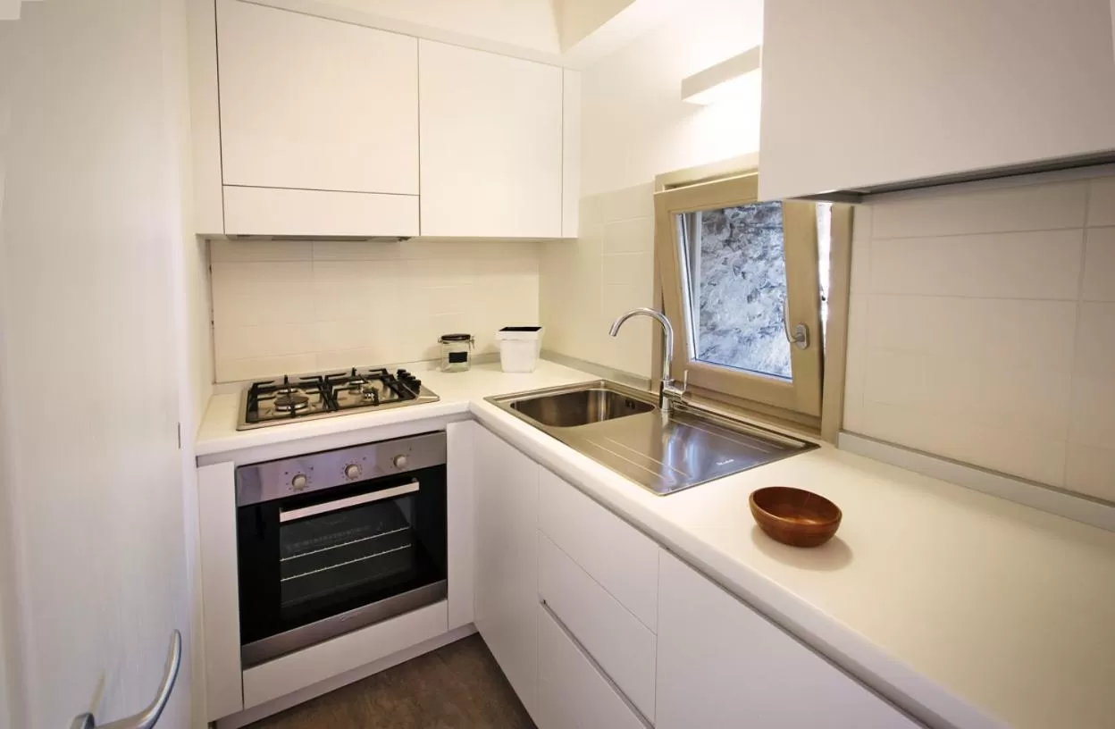 Kitchen or kitchenette in Albergo Diffuso Tolmezzo