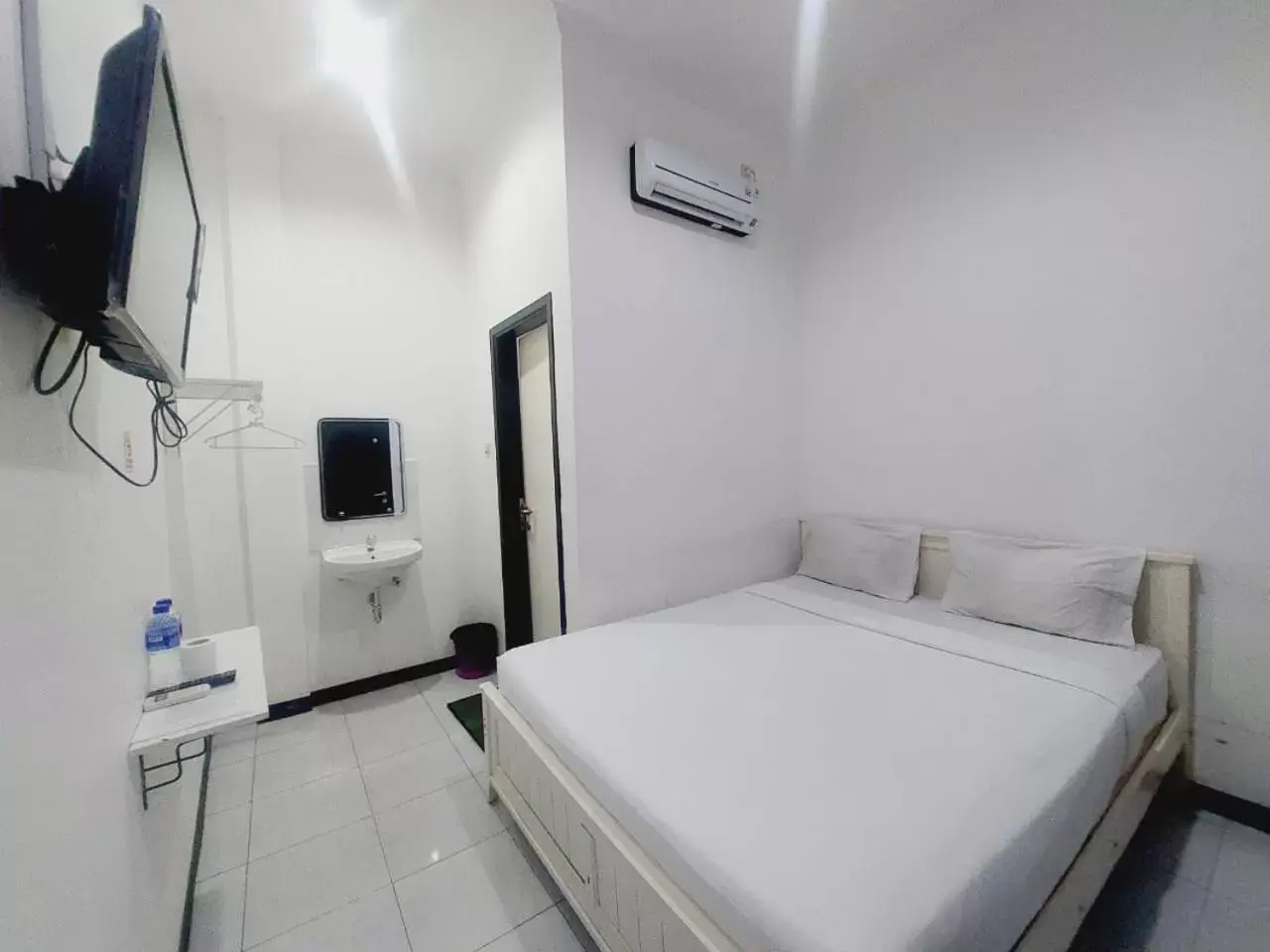 Bed in COZY STAY KUPANG