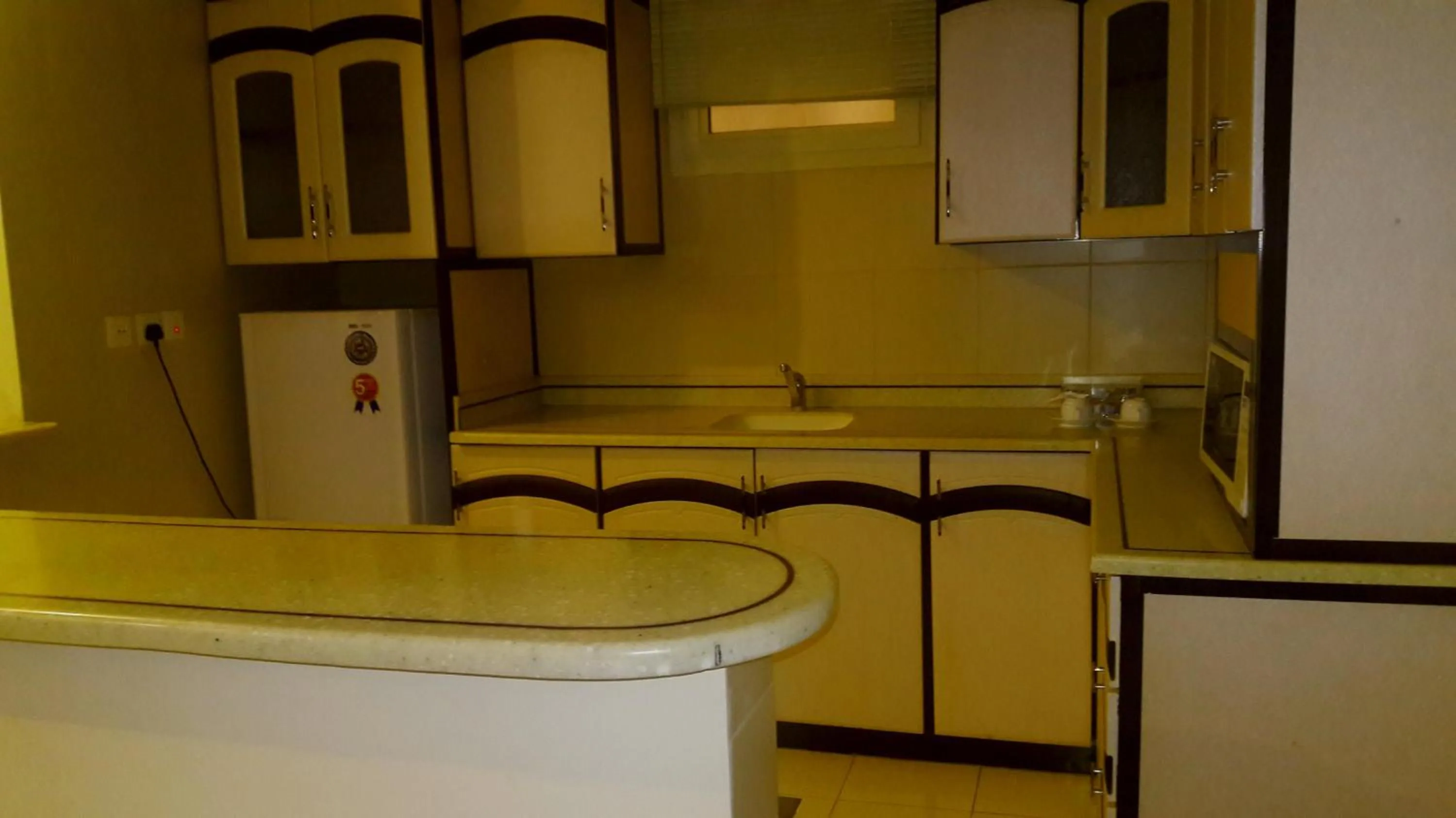 Kitchen or kitchenette in فندق حديقة الأزهار