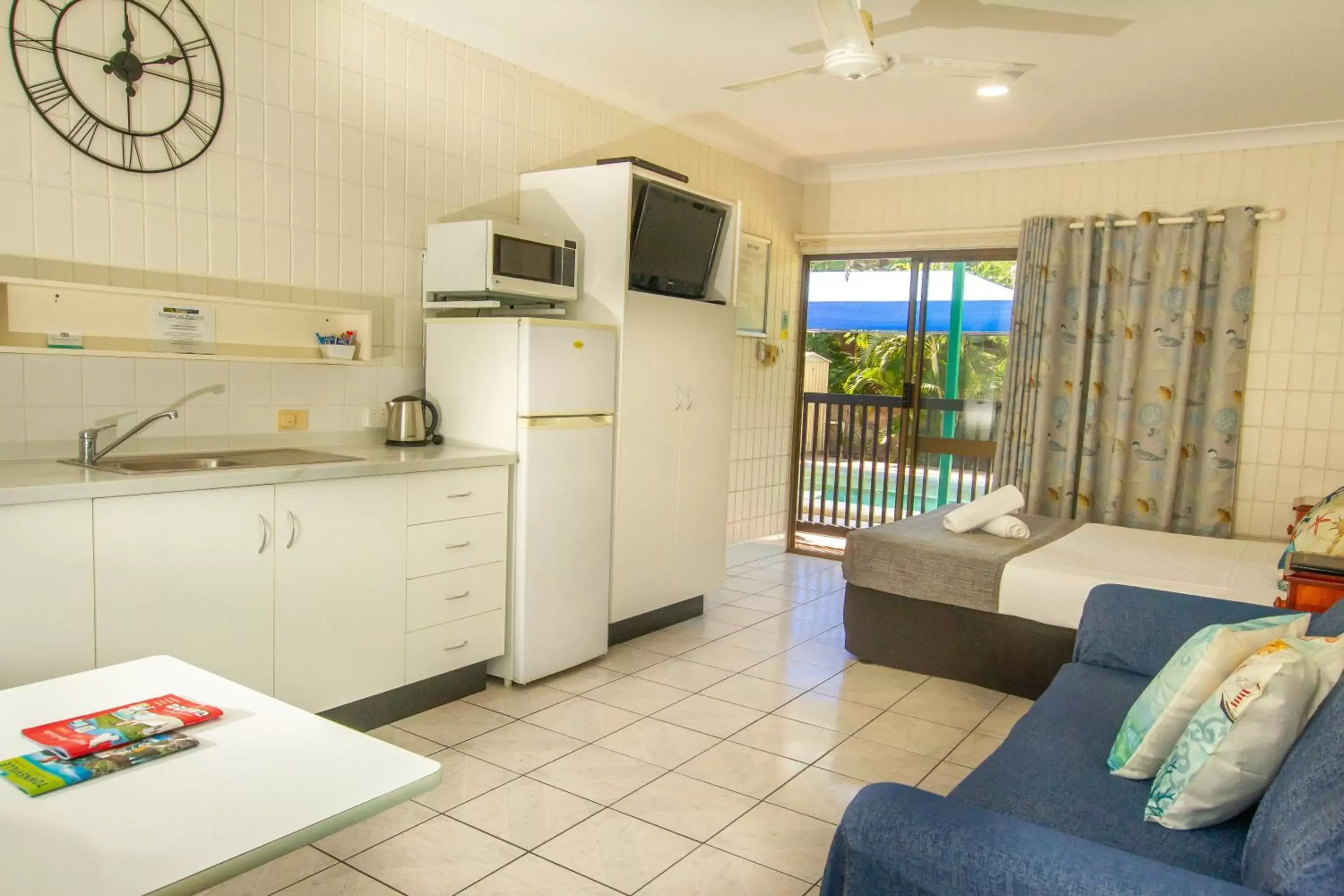 Kitchen/Kitchenette in Tropical Palms Resort & 4WD Hire