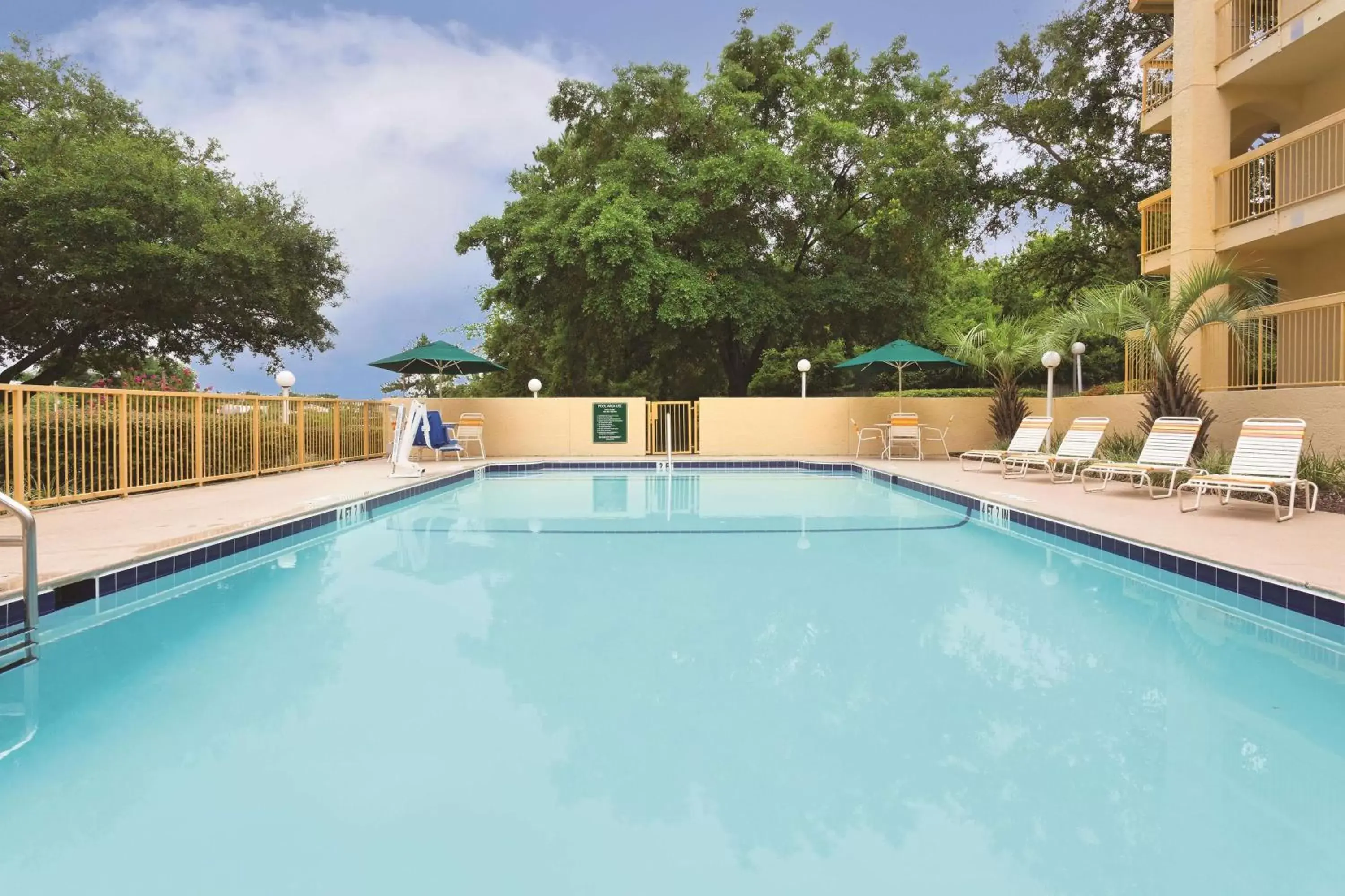 On site, Swimming Pool in Days Inn by Wyndham Gainesville Florida