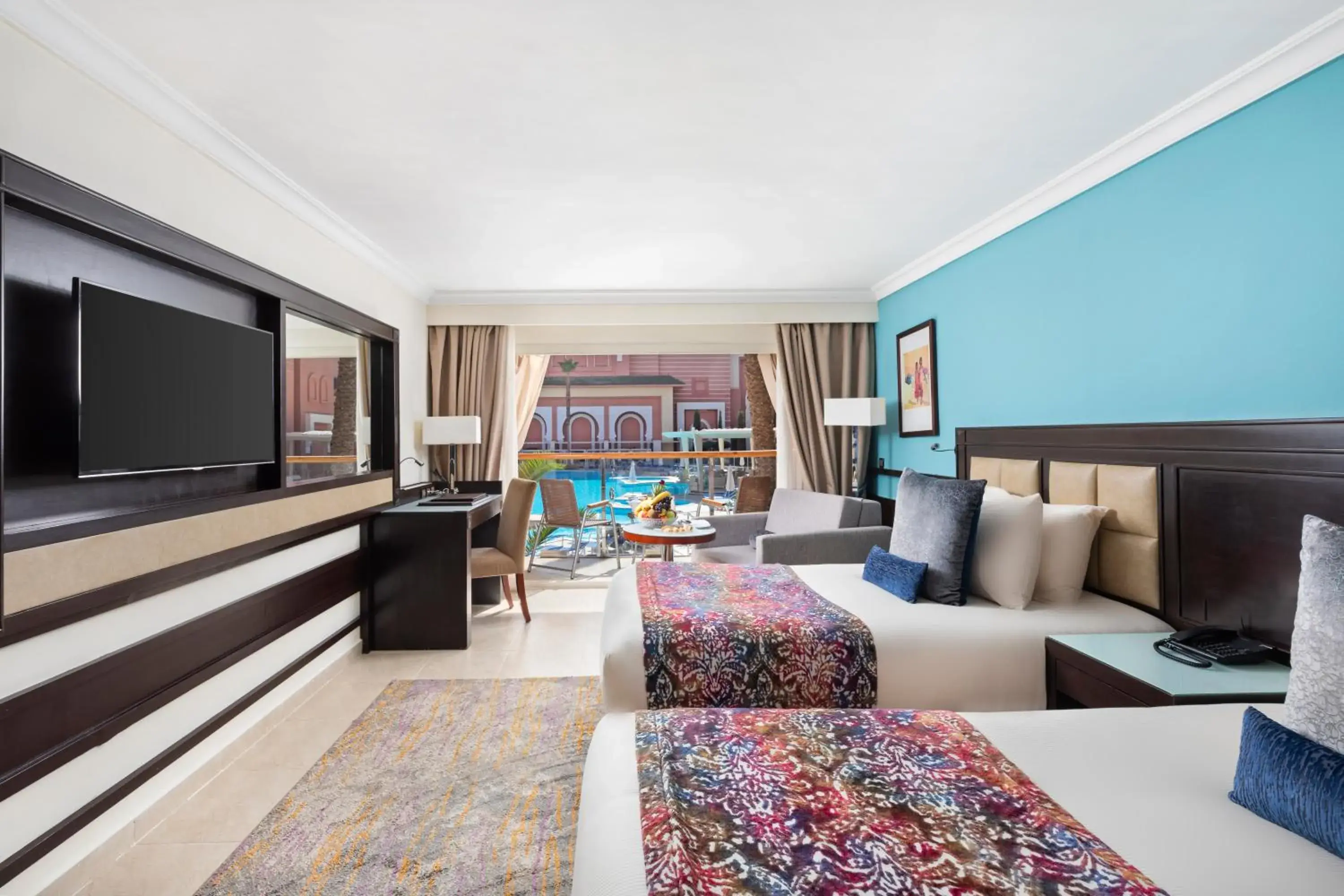 Bed, TV/Entertainment Center in Savoy Le Grand Hotel Marrakech