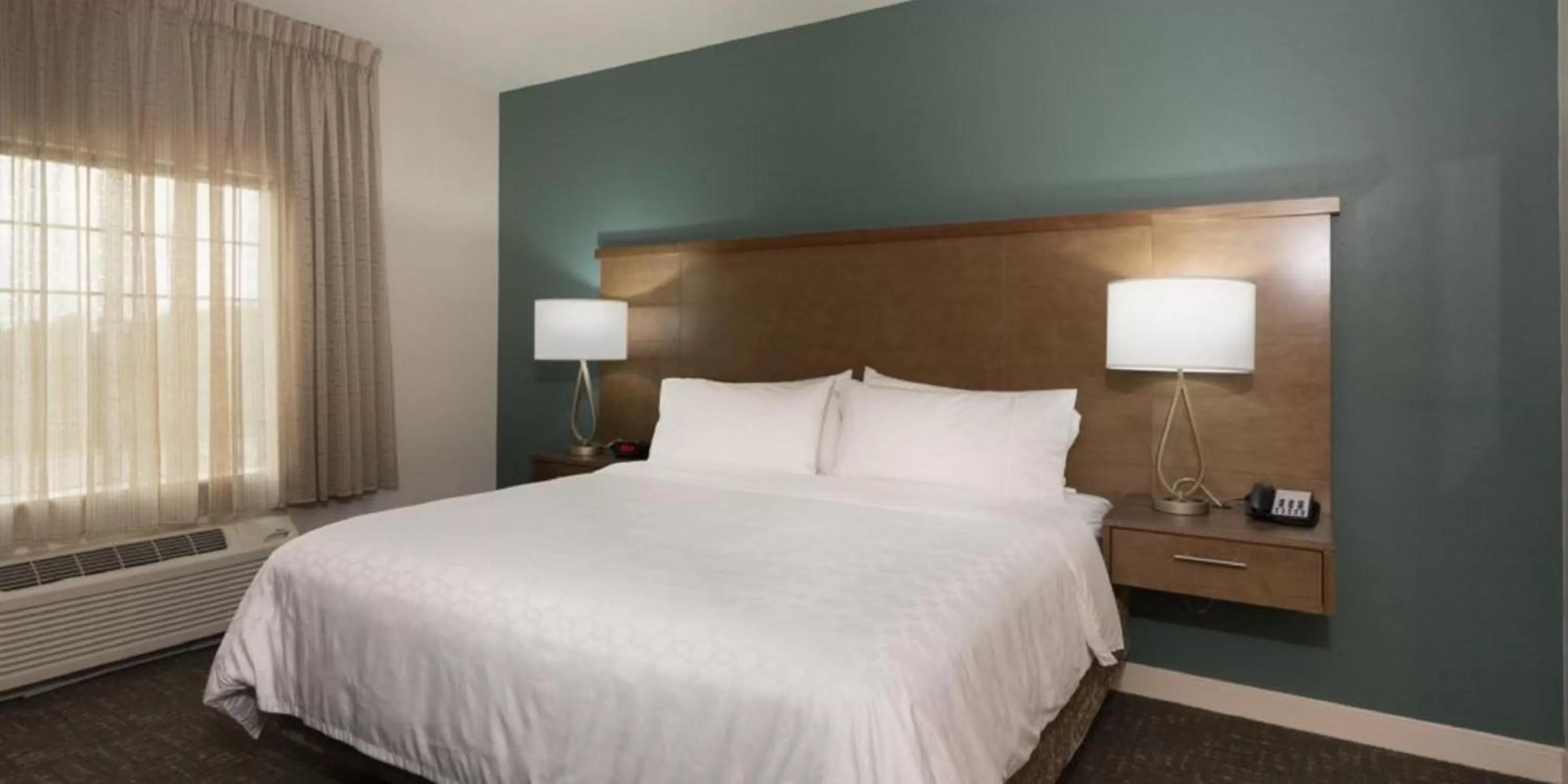 Photo of the whole room, Bed in Staybridge Suites Houston East - Baytown by IHG