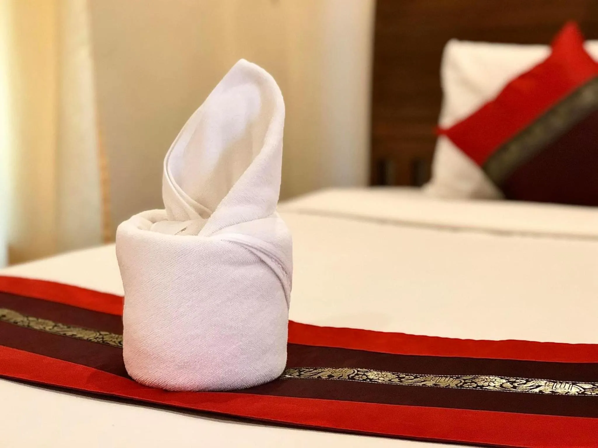 towels, Bed in Home Inn Pai Garden