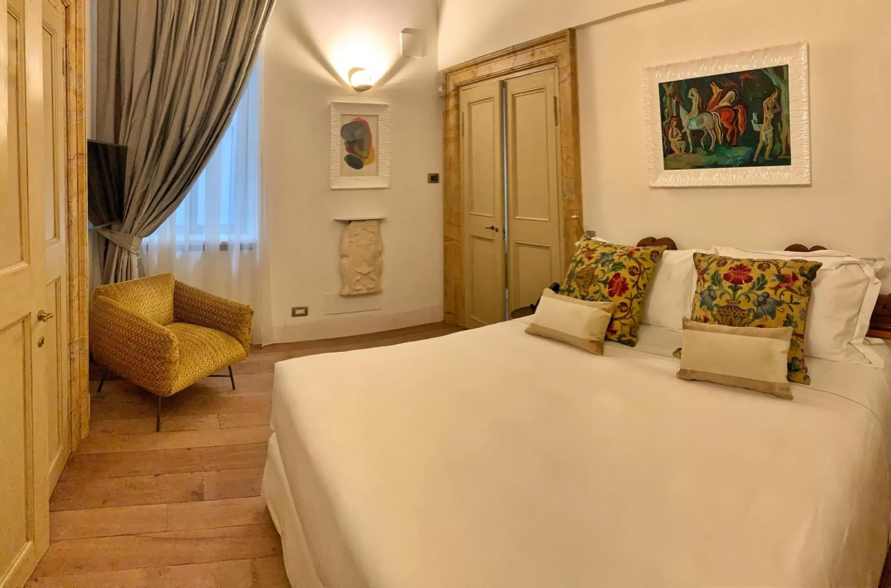 Bed in Palazzo Delle Pietre - Luxury Apartments