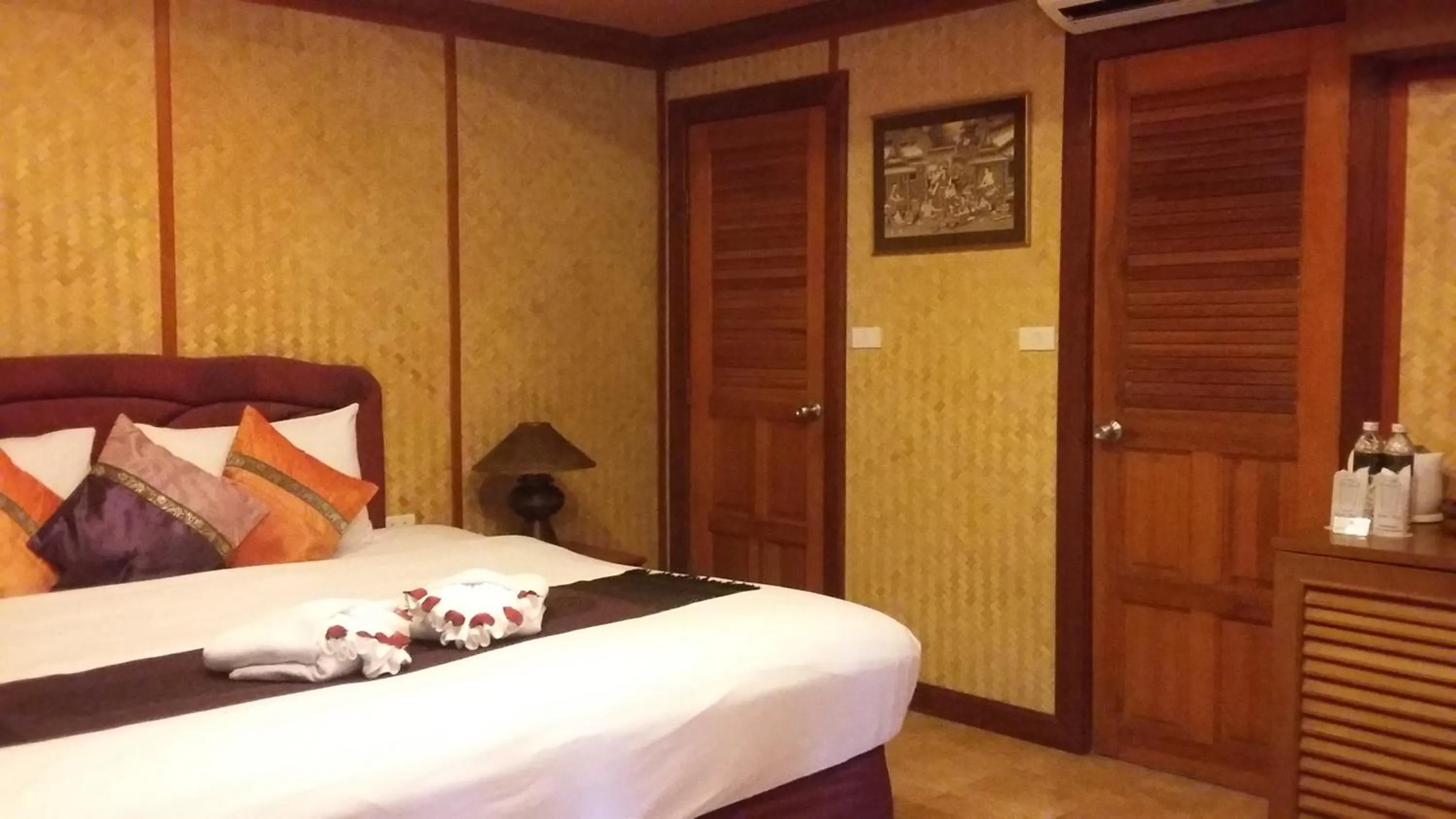 Photo of the whole room, Bed in Royal Phawadee Village Patong - 2 Minutes walk to the beach