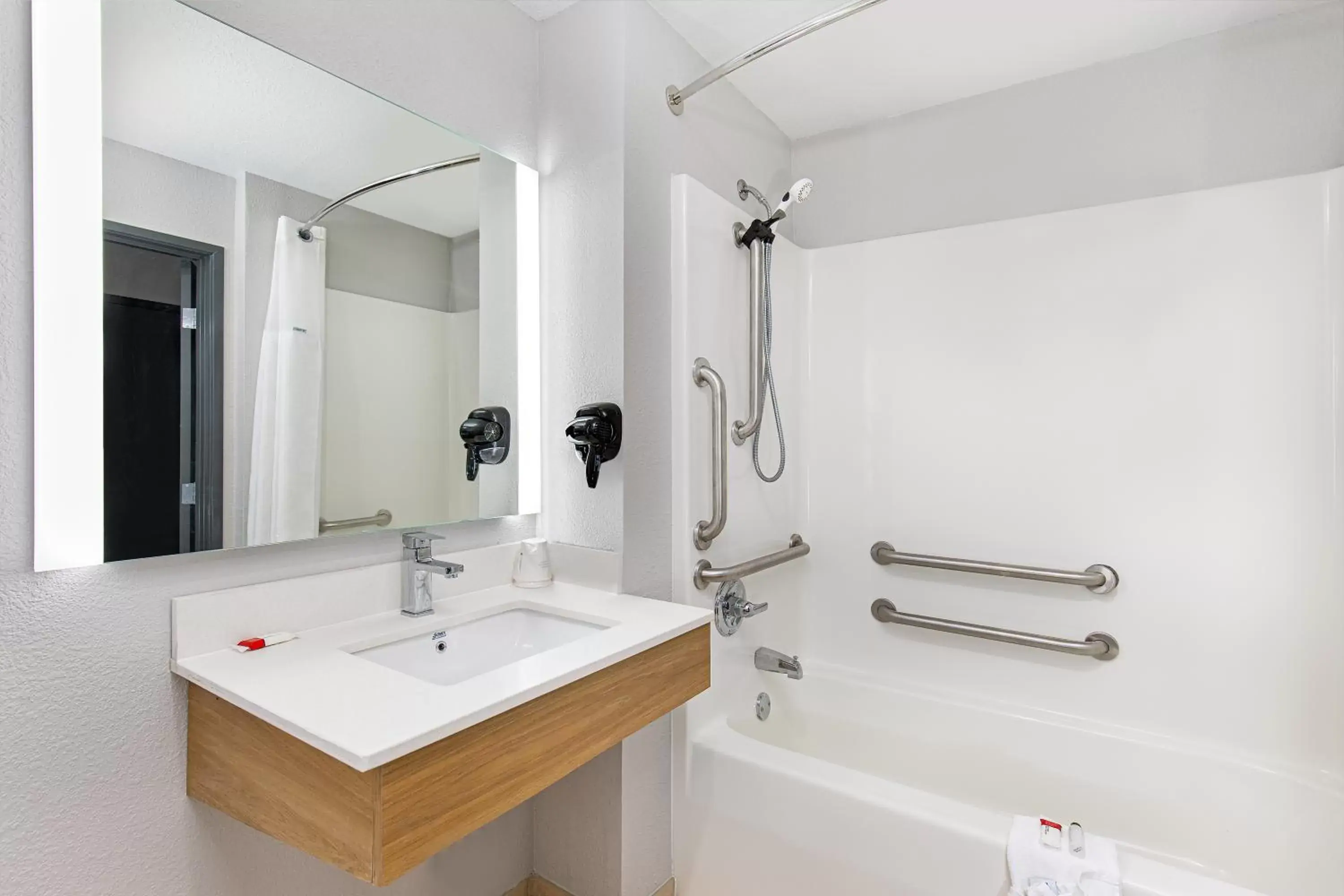 Bathroom in Microtel Inn & Suites by Wyndham Manchester - Newly Renovated
