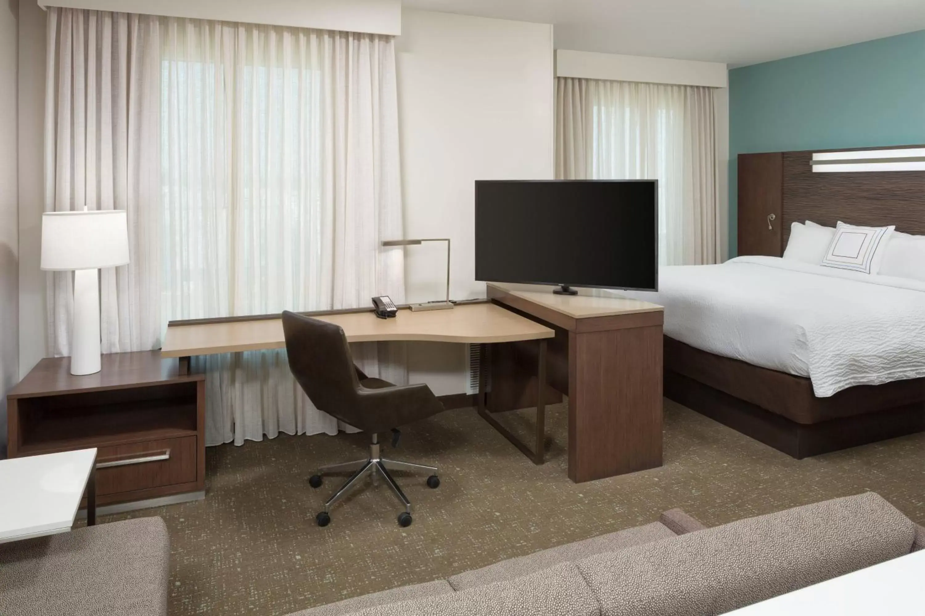 Photo of the whole room, TV/Entertainment Center in Residence Inn by Marriott Ontario Rancho Cucamonga