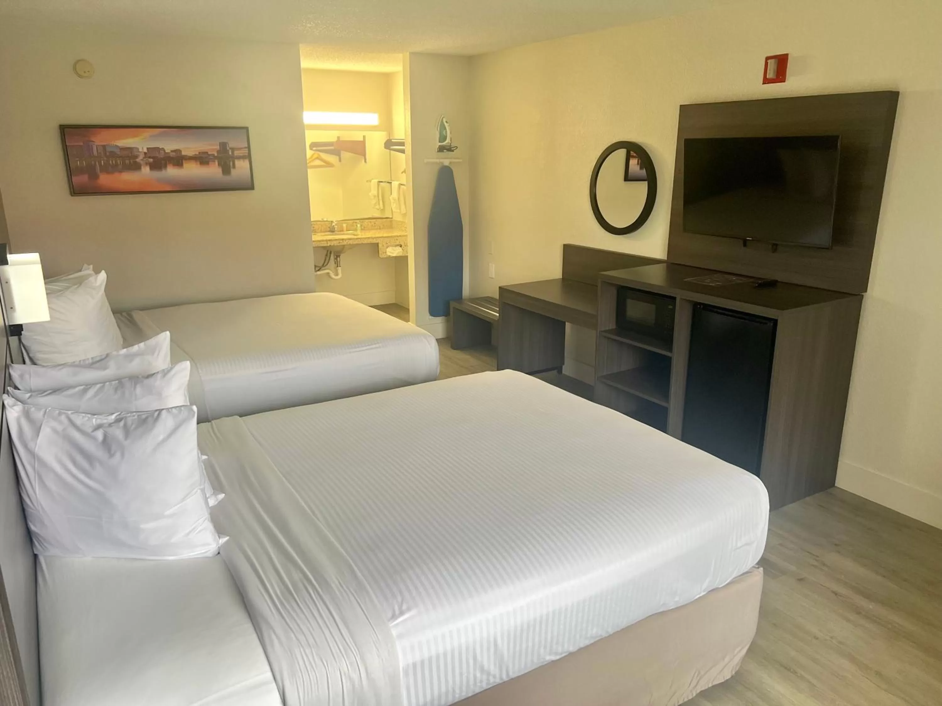 Bed in Quality Inn & Suites Orlando East - UCF Area