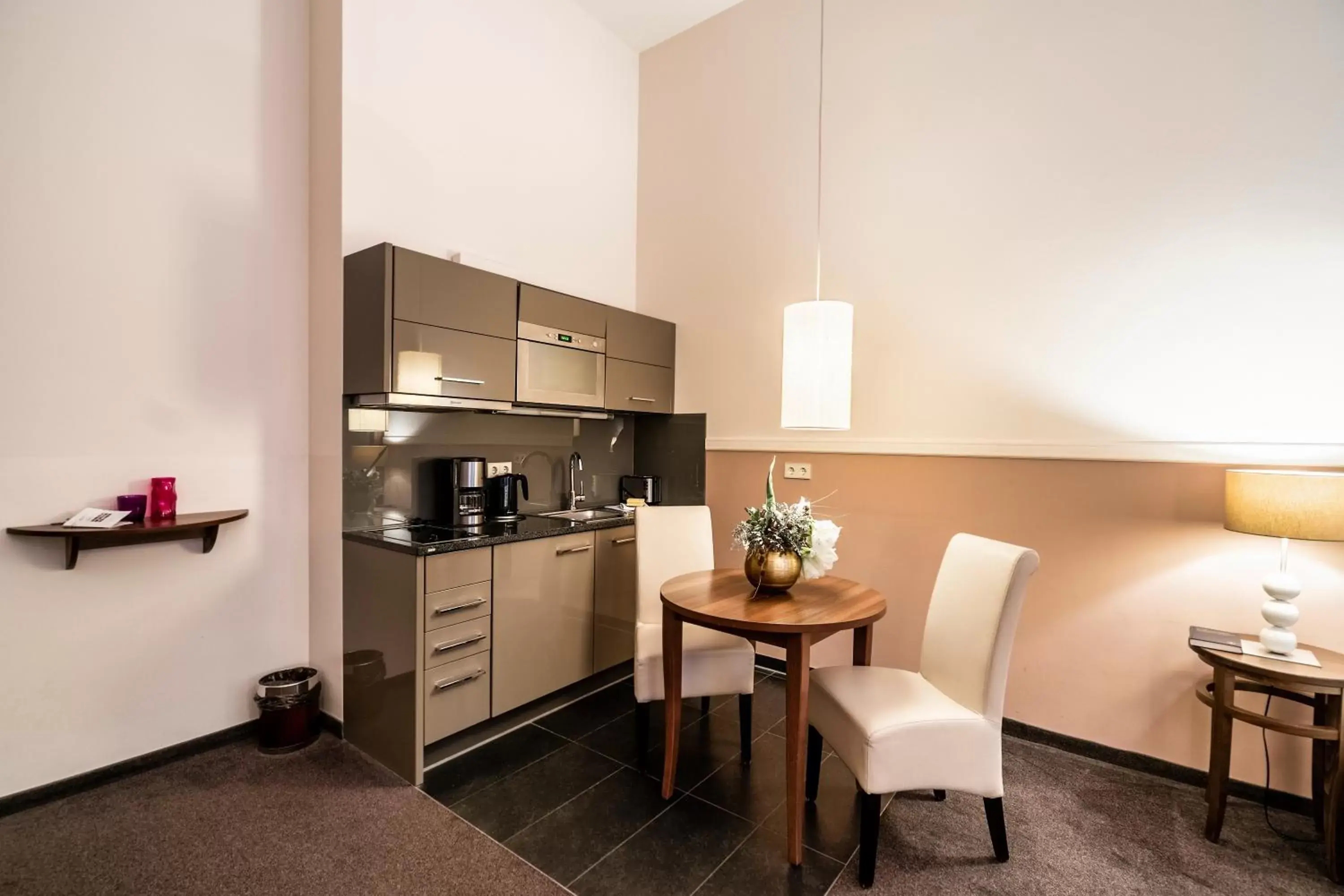 Kitchen or kitchenette, Kitchen/Kitchenette in Aparthotel Am Schloss