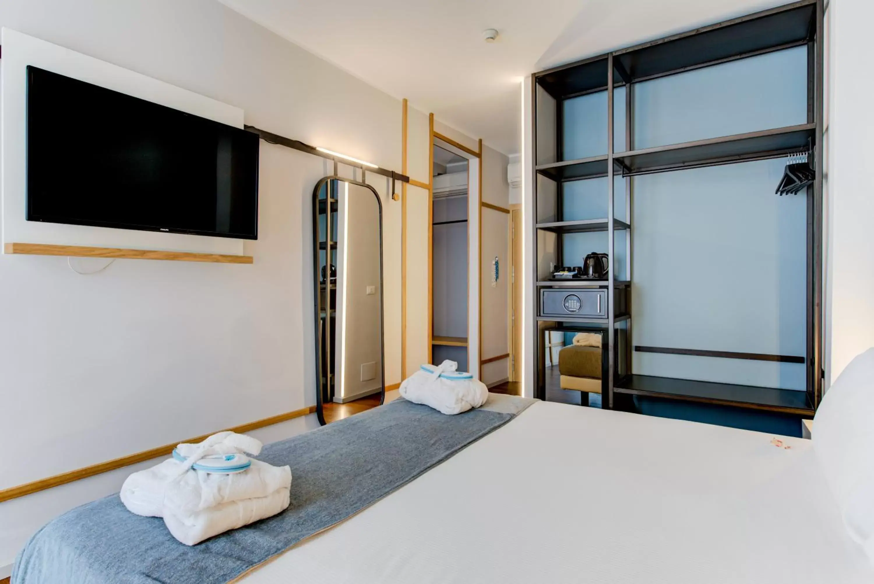 Bedroom, TV/Entertainment Center in BeYou Hotel Polo