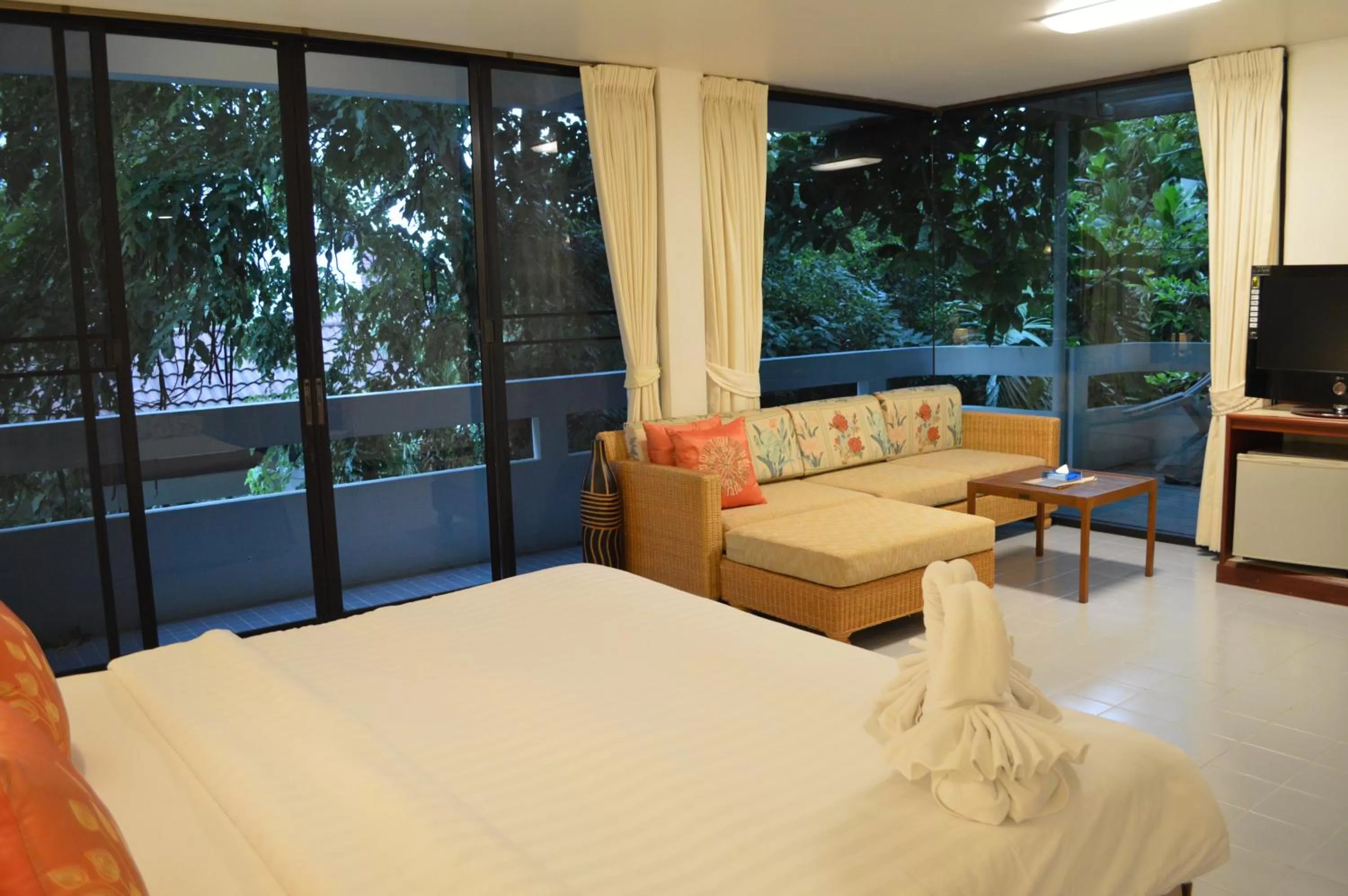 Seating area, Bed in Nern Chalet Beachfront Hotel