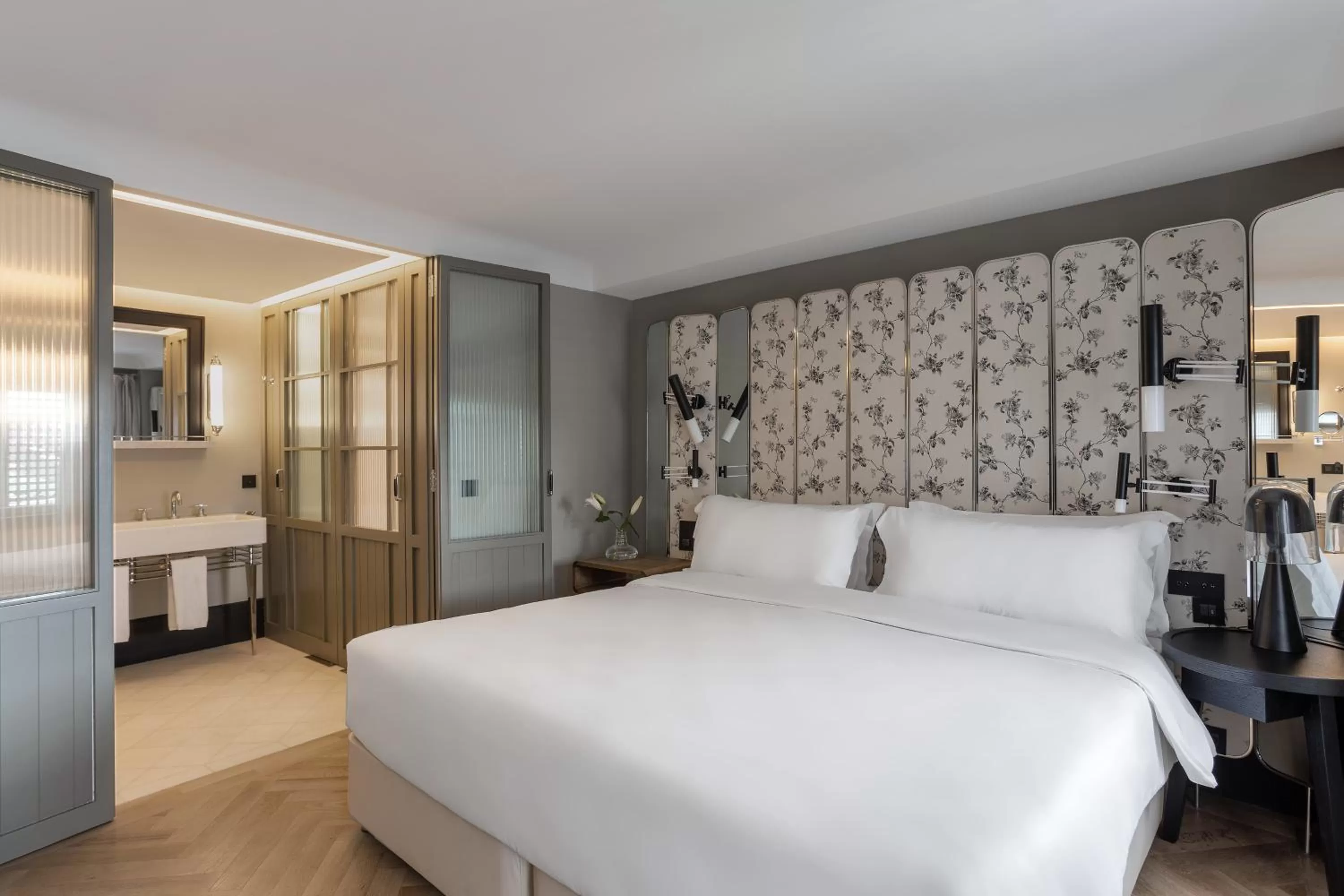 Bed in The Wings Hotels Collection