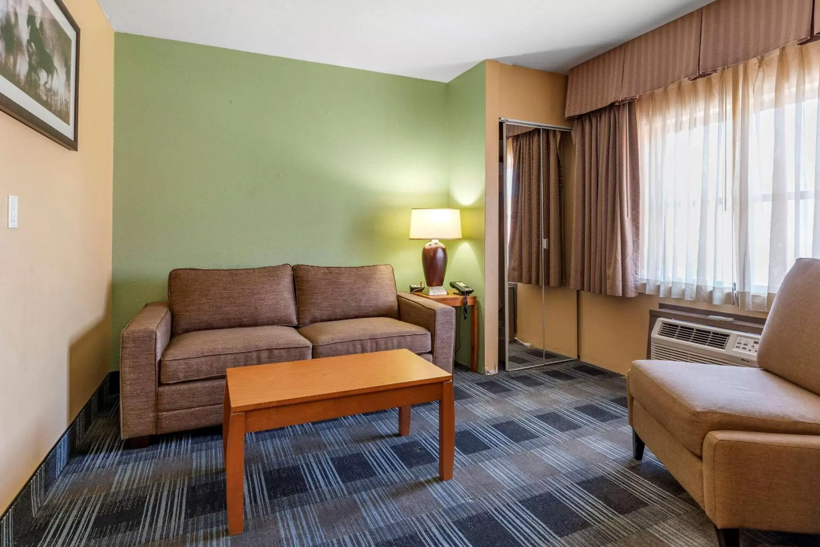 Bedroom, Seating Area in Quality Inn