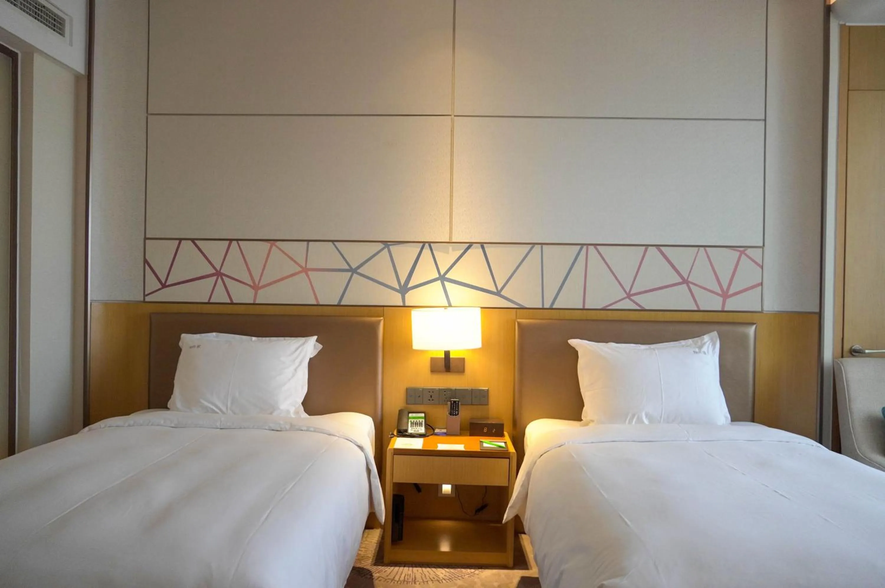 Bed in Holiday Inn Tianjin Xiqing by IHG