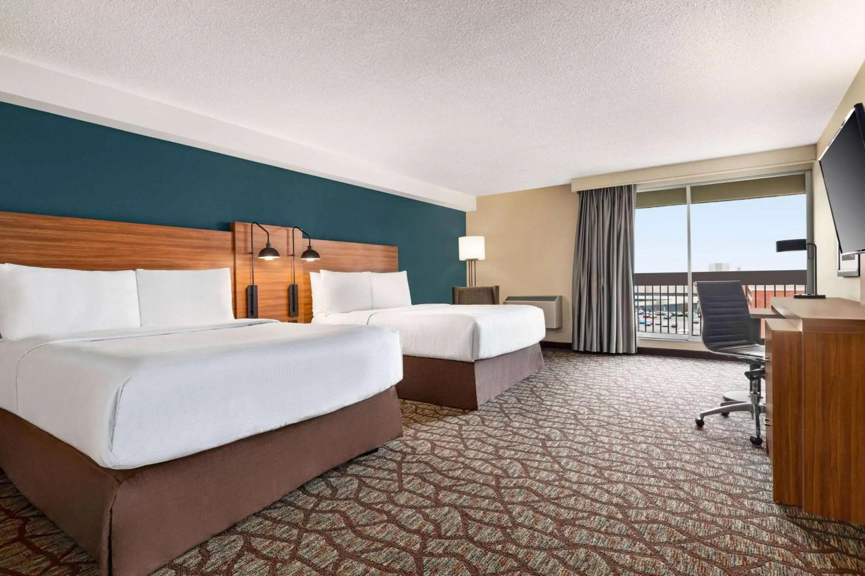 Photo of the whole room, Bed in Wyndham Garden Niagara Falls Fallsview