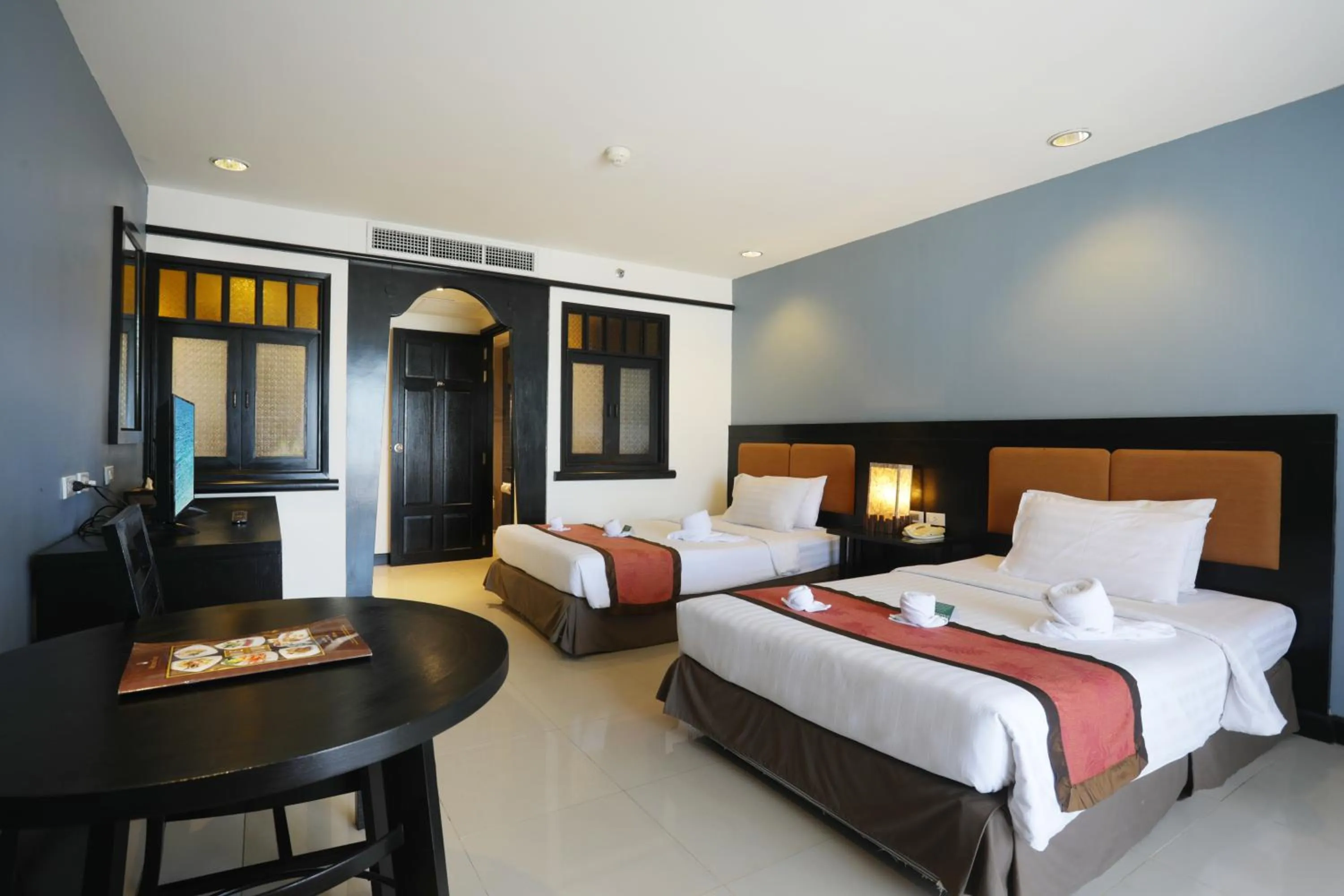 Bed in Woraburi Phuket Resort & Spa - SHA Plus