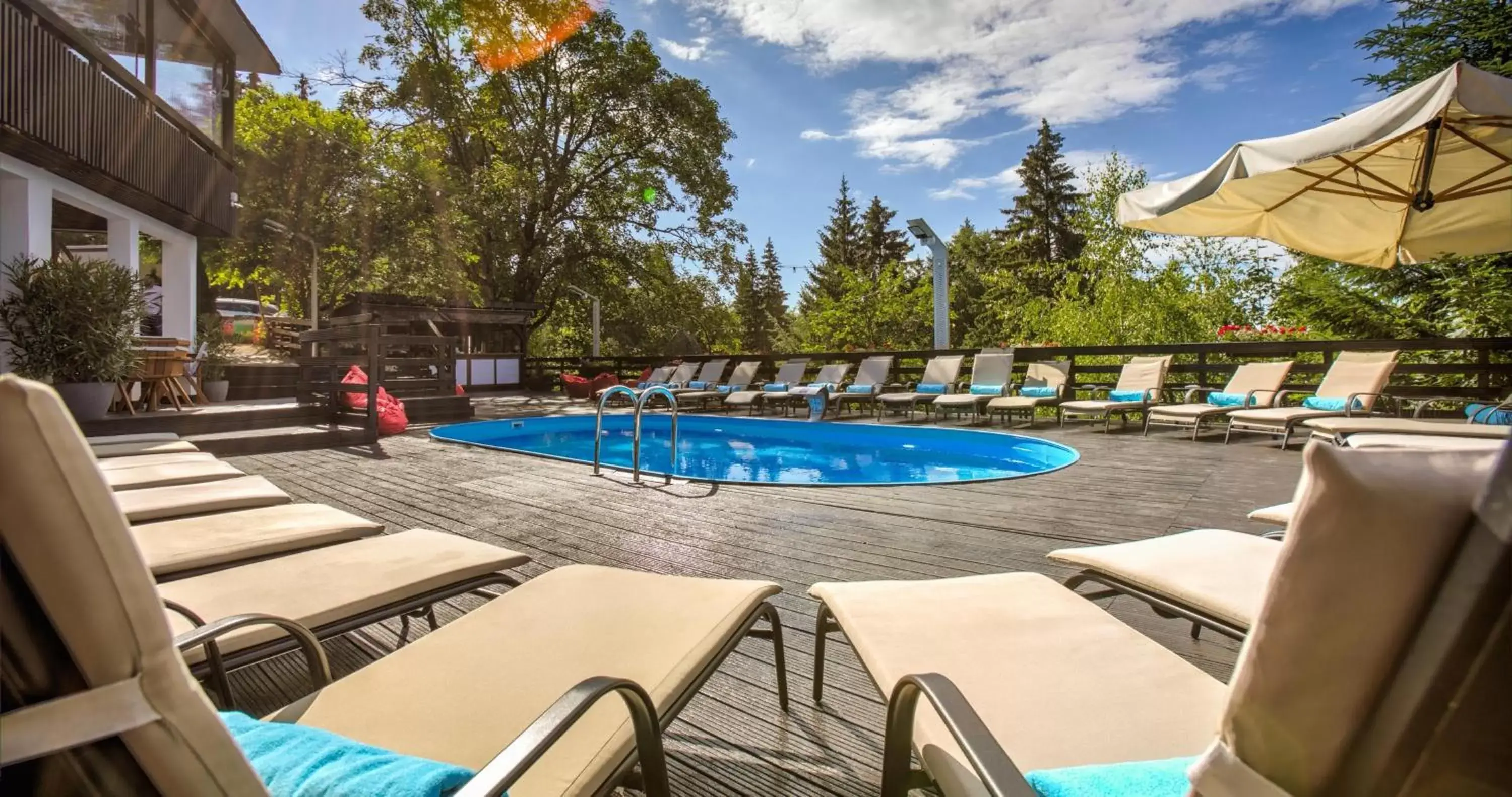 Patio, Swimming Pool in Alpin Resort Hotel