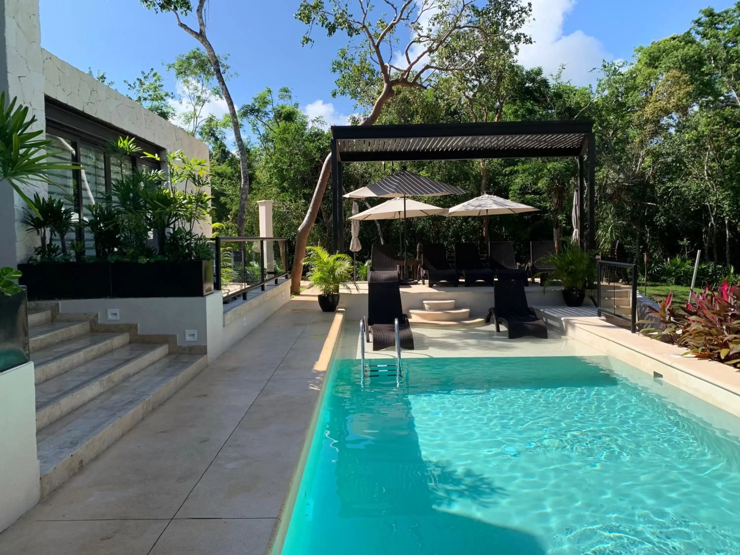 Swimming Pool in Xaha Villas Suites & Golf Resort