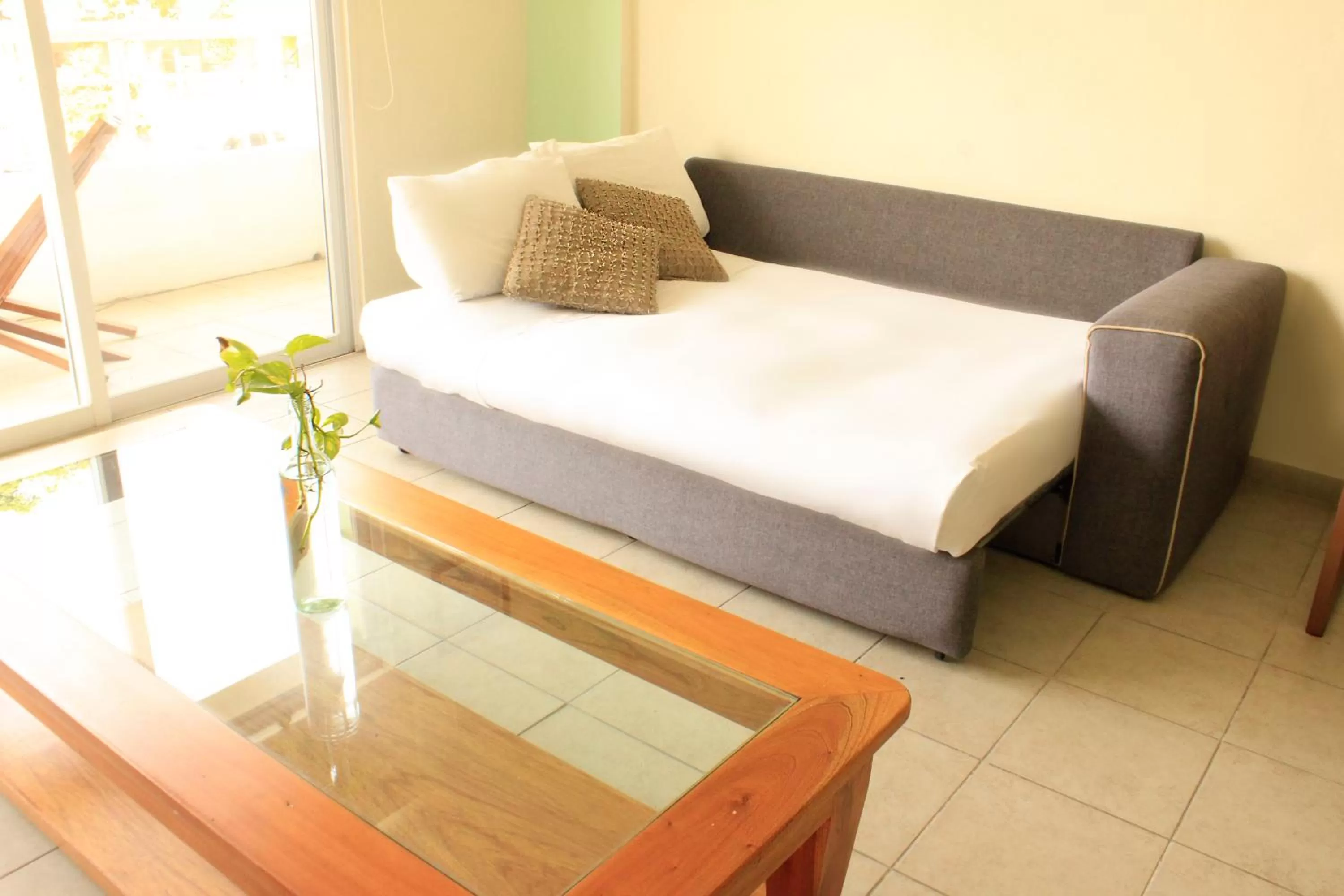 Bed in La Palmita Budget Boutique Hotel