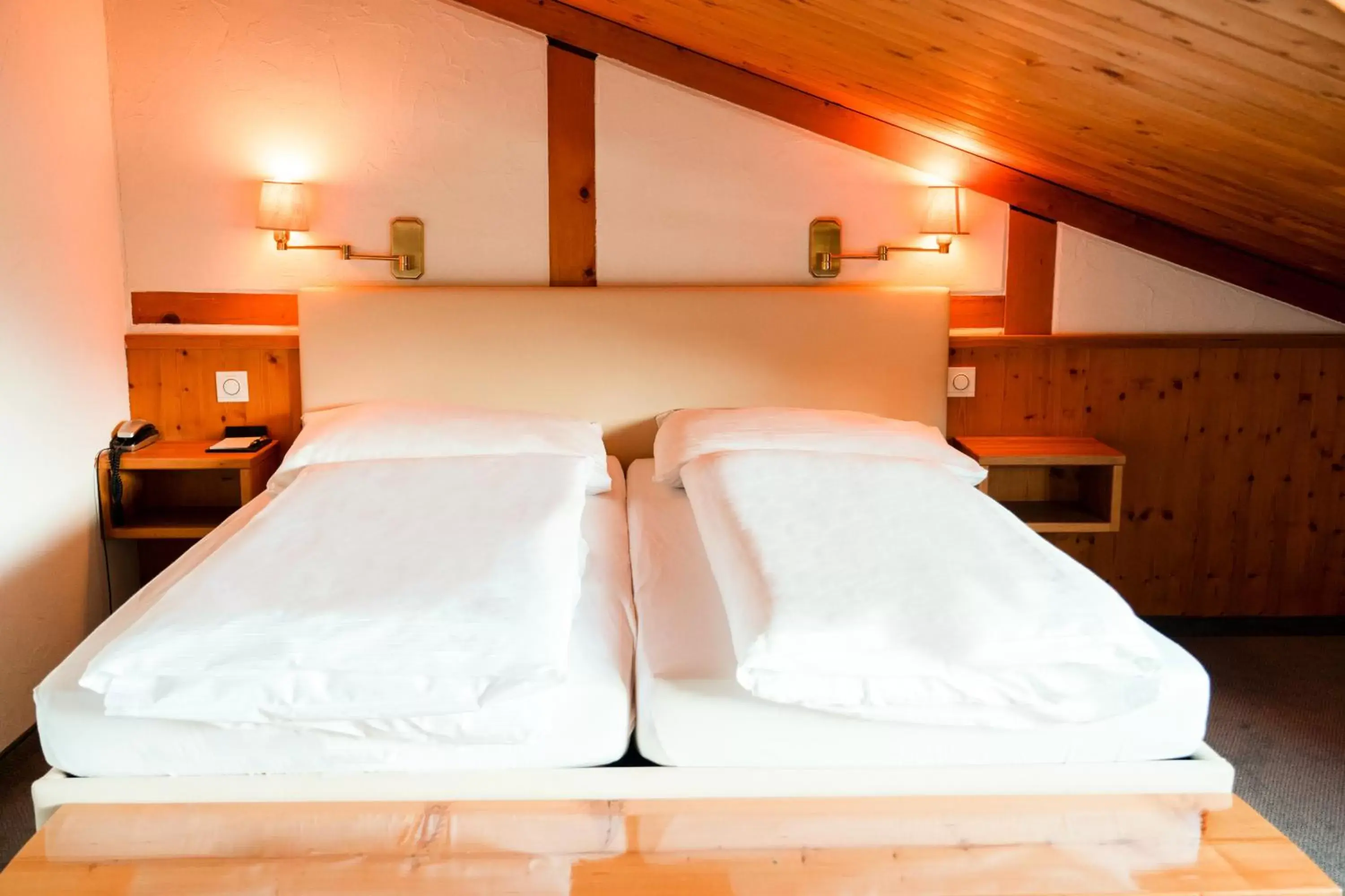 Bed in Hillsite Hotel Restaurant Flims